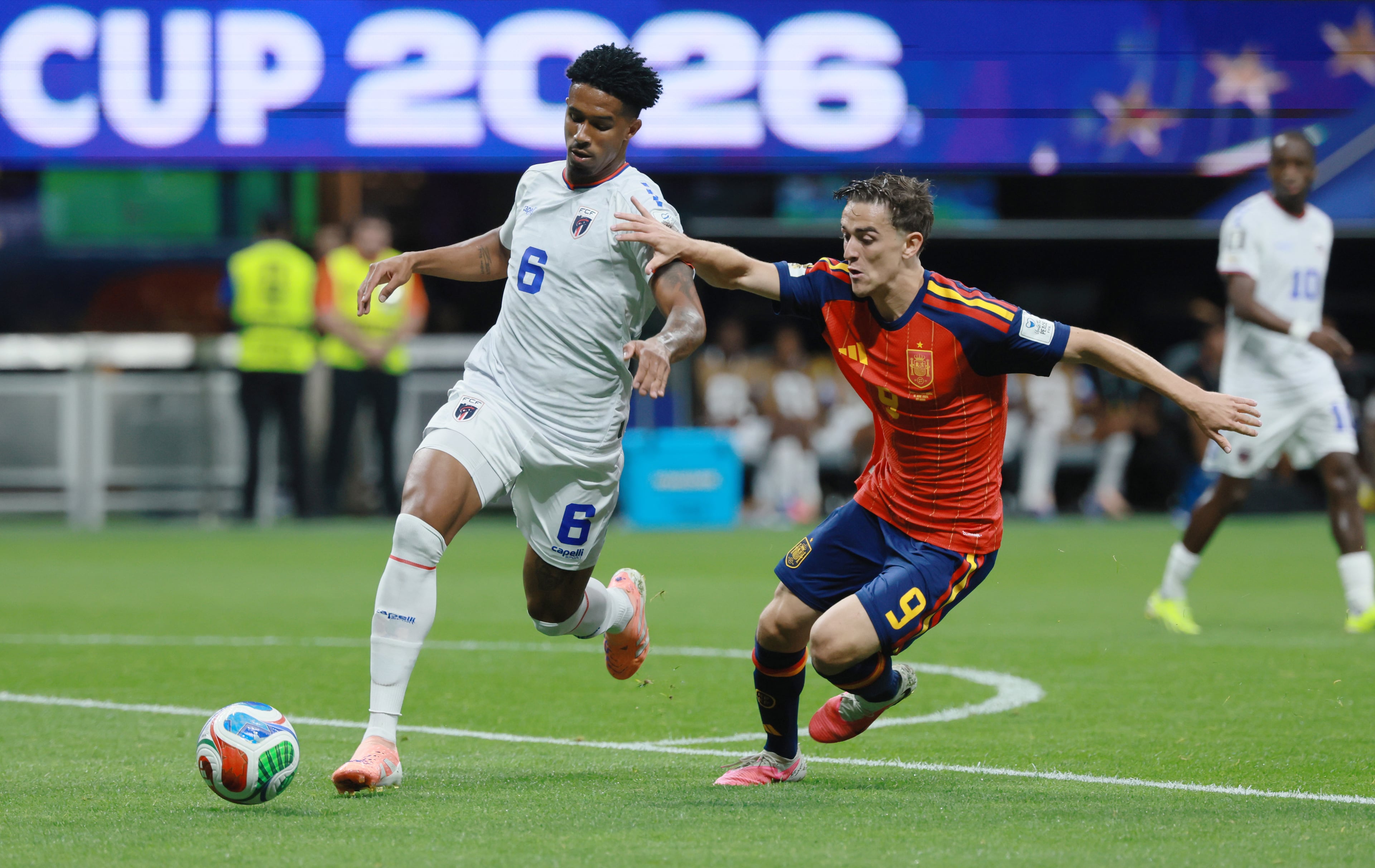 Cape Verde's Kevin Pina (left) tries to keep ahead of Spain's Gavi (right) during first half of Spain vs. Cape Verde Group H match at Atlanta Stadium (Mercedes-Benz Stadium) on Monday, June 15, 2026. (Jason Getz/AJC)