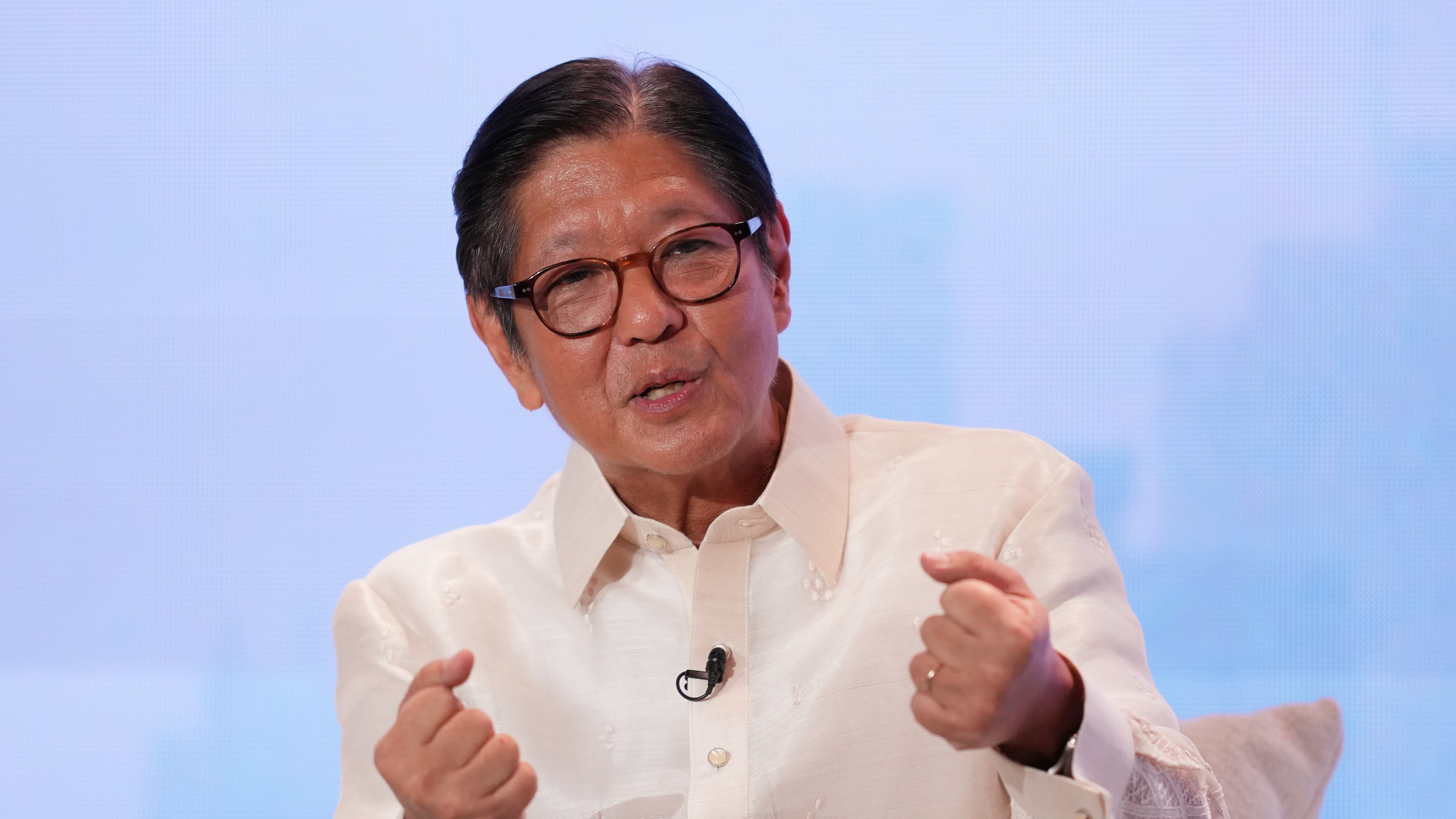 FILE - Philippine President Ferdinand Marcos Jr. gestures as he answers questions at the ASEAN Editors and Economic Opinon Leaders Forum in Makati, Philippines on Tuesday, Feb. 24, 2026. (AP Photo/Aaron Favila, File)