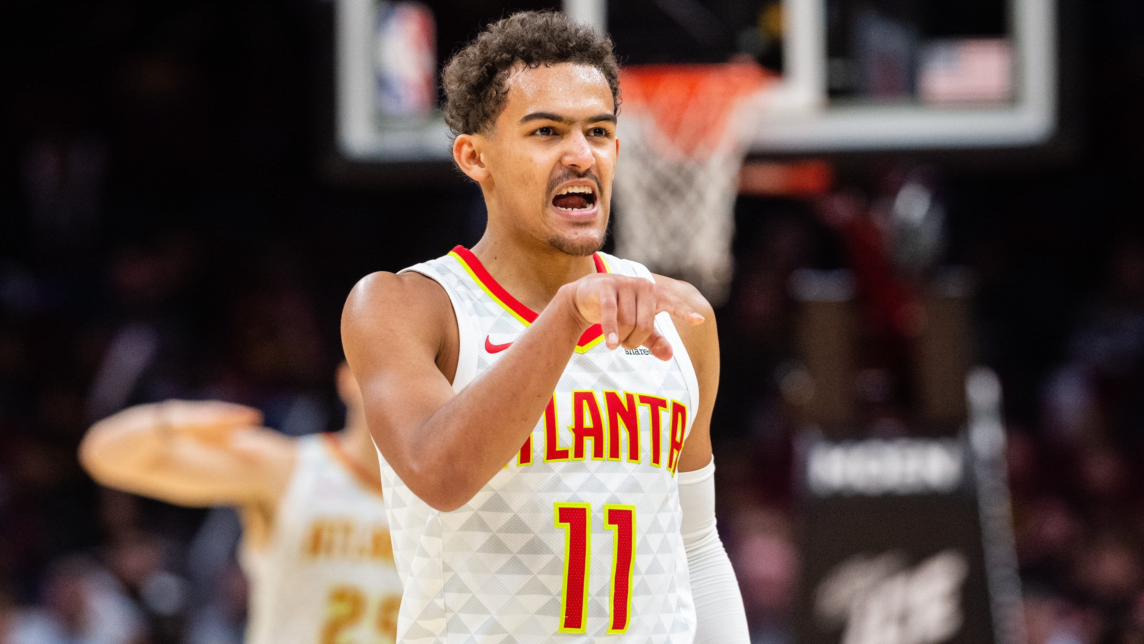 Trae Young of the Atlanta Hawks celebrates after the Hawks scored against the Cleveland Cavaliers during the second half at Quicken Loans Arena on October 21, 2018 in Cleveland, Ohio. The Hawks defeated the Cavaliers 133-111. (Photo by Jason Miller/Getty Images)