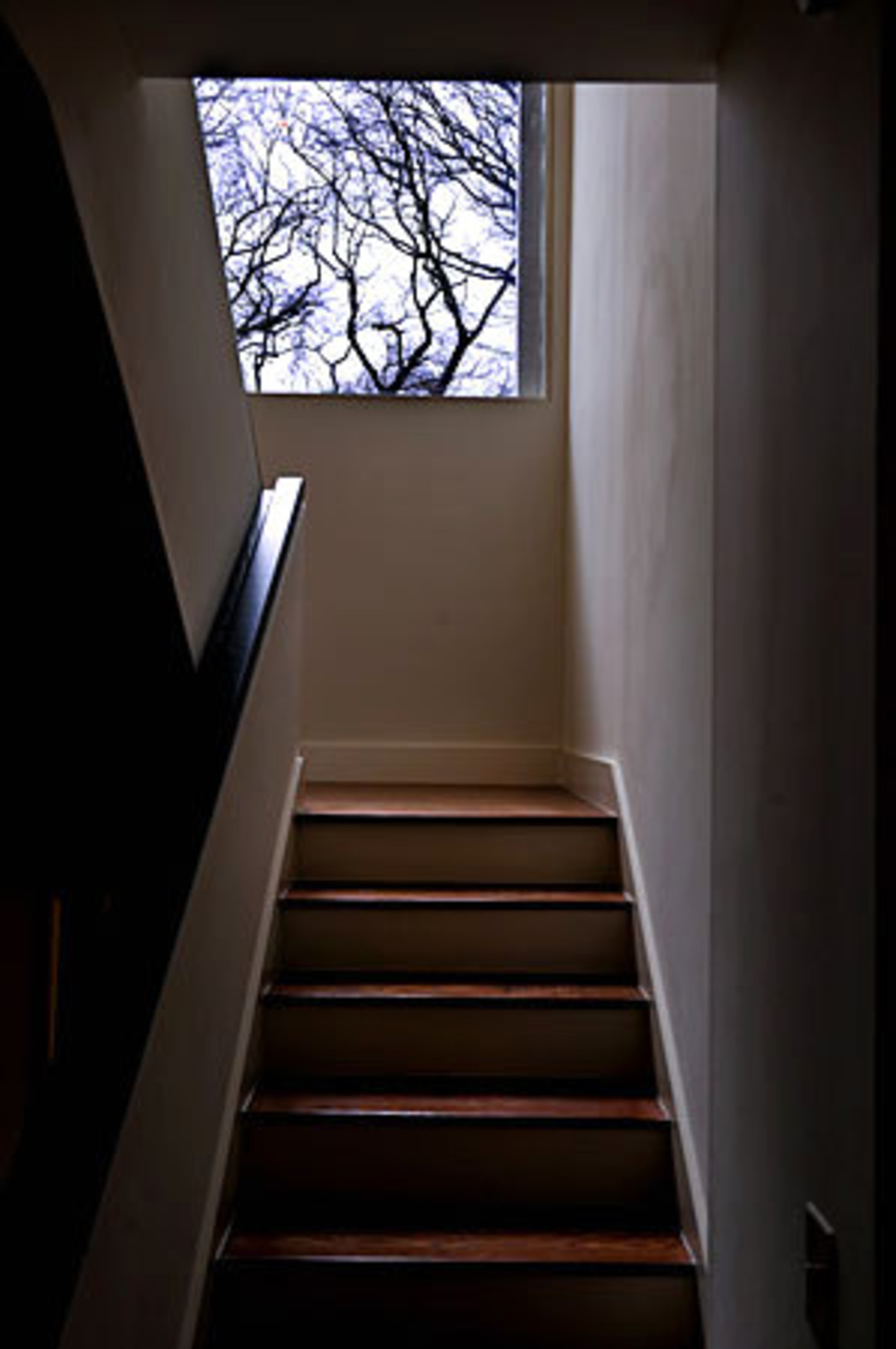 A stairwell leads to the roof.