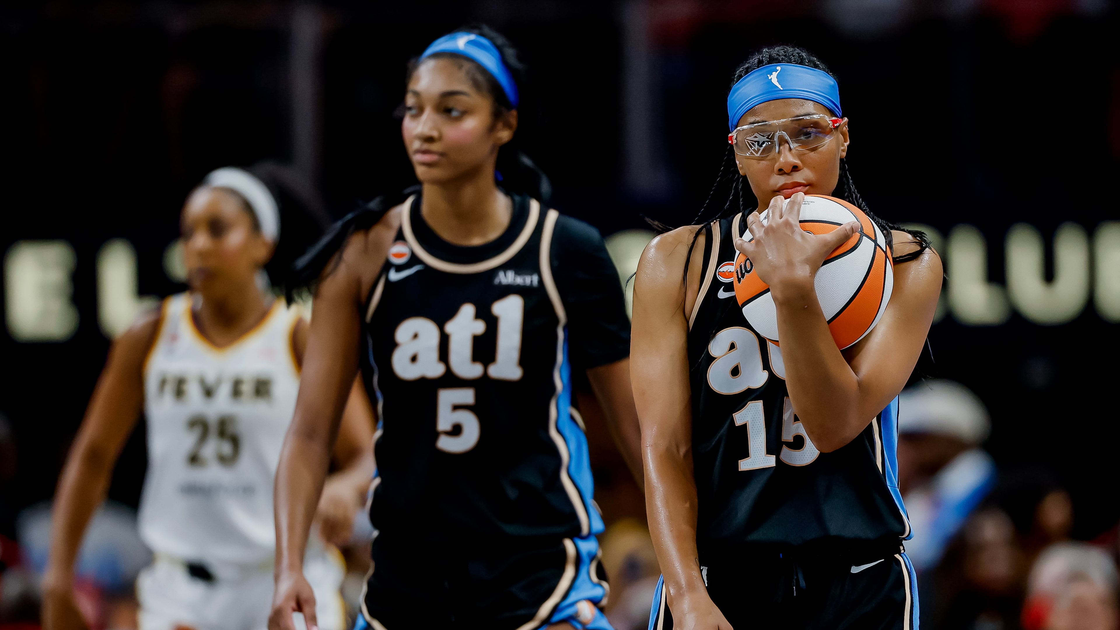 Atlanta Dream guard Allisha Gray (right) and forward Angel Reese react during the second half of a game against the Indiana Fever on Sunday, Aug. 16, 2026 at State Farm Arena in Atlanta. (Erik S. Lesser for the AJC)