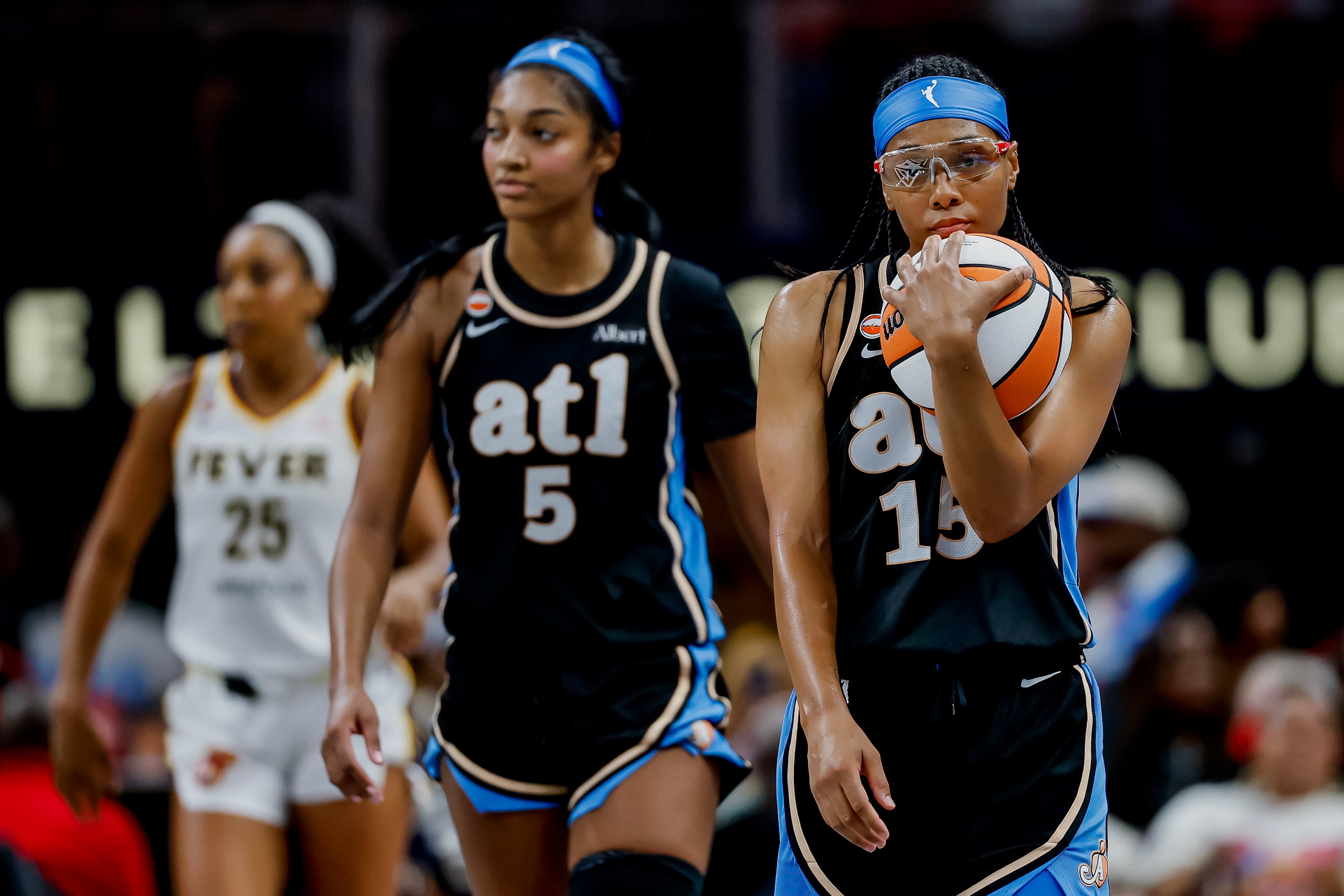 Dream guard Gray (right) and forward Reese react during the second half of the WNBA game between the Dream and the Fever. (Erik S. Lesser for the AJC)