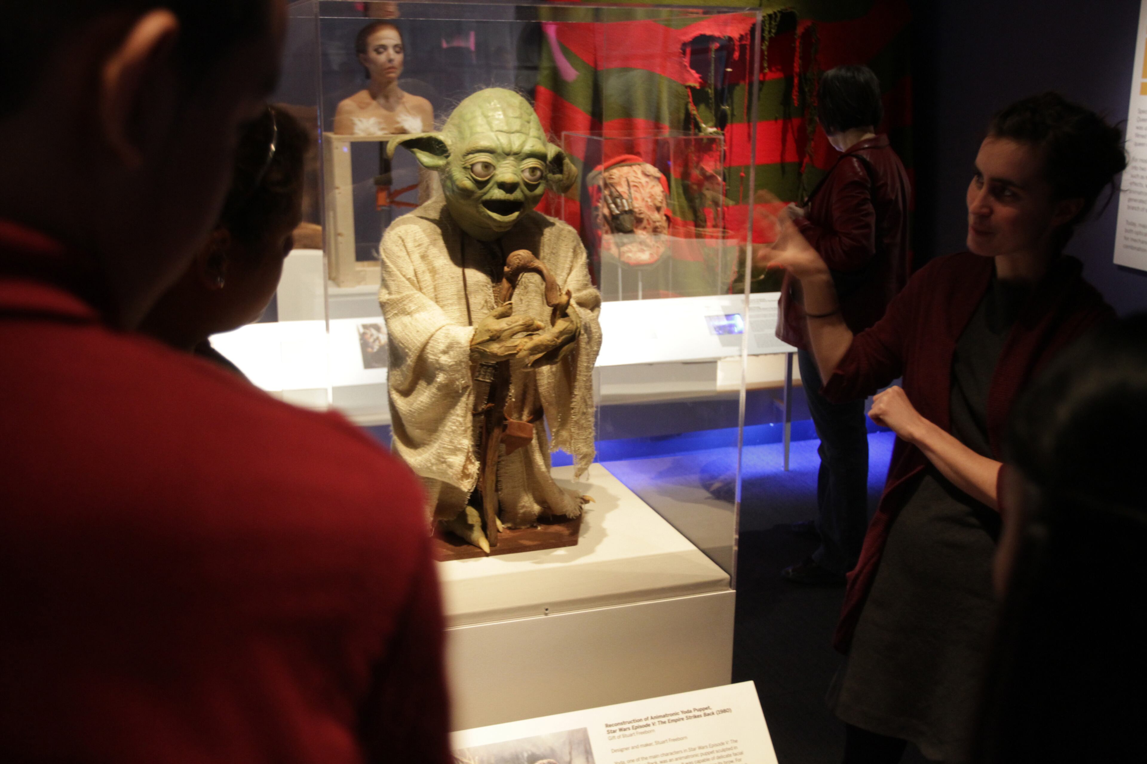 This undated image provided by the Museum of the Moving Image shows young visitors encountering Yoda, the "Star Wars" character, in the museum's core exhibition "Behind the Screen," in the Astoria section of the Queens borough of New York. The artifact, which was a gift to the museum from Stuart Freeborn, is one of a number of items related to popular movies on display at the museum, which also offers hands-on exhibits ranging from old video games to equipment that lets visitors dub their own voices into a scene from a famous film. The Museum of the Moving Image is one of a number of attractions in Astoria and the adjacent neighborhood of Long Island City. Tourists are turning up in Long Island City these days because of a hotel boom there.
