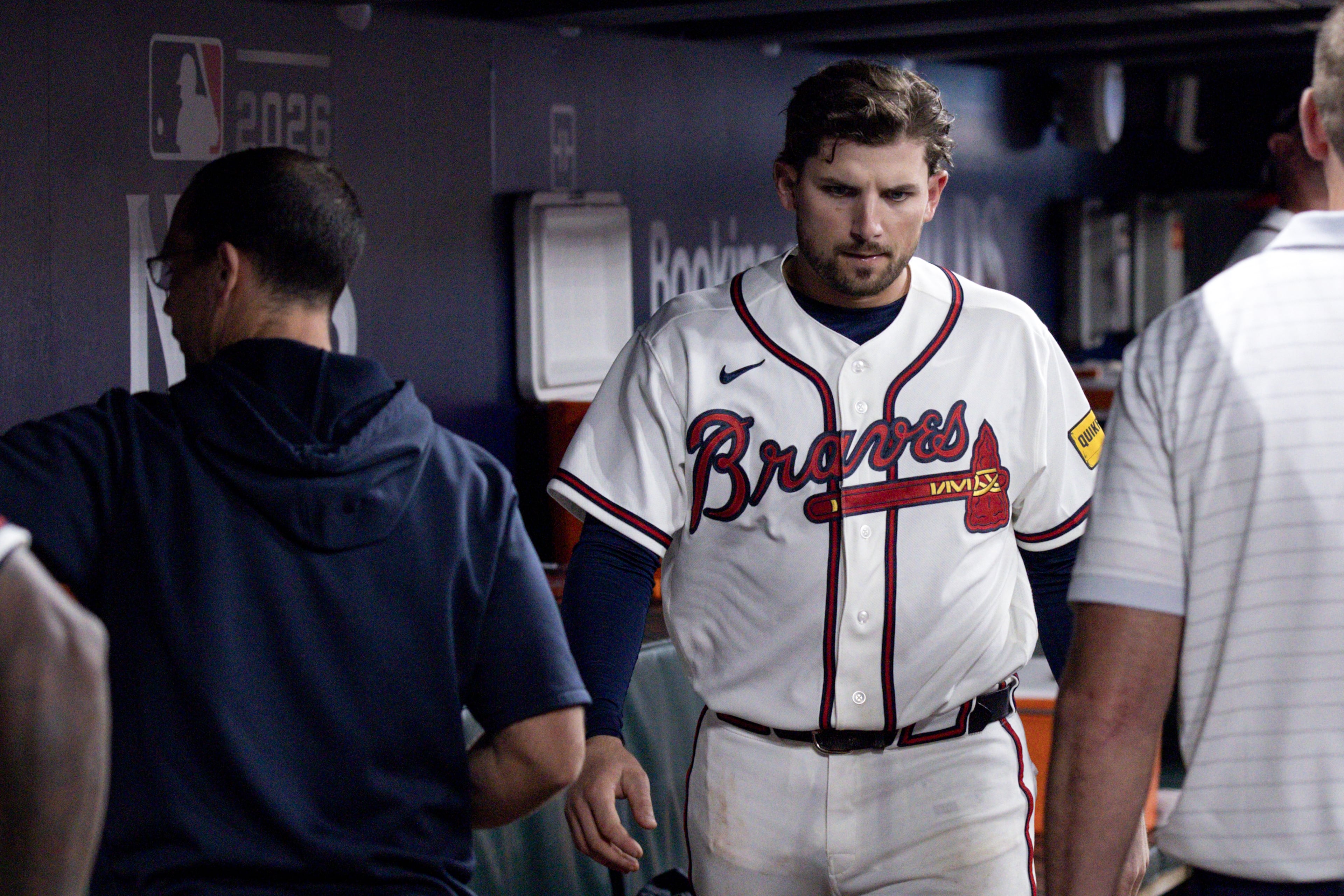 Atlanta Braves third baseman Austin Riley (27) reacts in the dugout after losing to the Los Angeles Dodgers in Game 4 of the MLB National League Division Series between the Atlanta Braves and the Los Angeles Dodgers, Wednesday, Oct. 7, 2026, in Atlanta. The Dodgers defeated the Braves 3 games to 1. (Miguel Martinez/AJC)