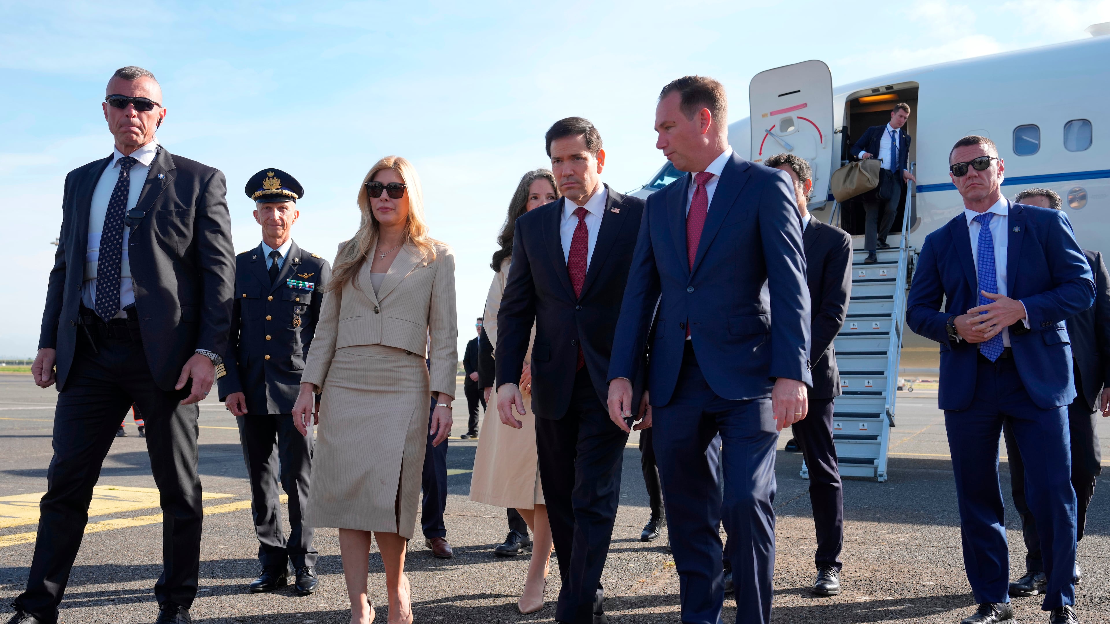 US Secretary of State Marco Rubio meets U.S. Ambassador to the Holy See Brian Burch upon hi arrival at Rome's Ciampino airport for a two-day visit to Italy and the Vatican, Thursday, May 7, 2026. (AP Photo/Andrew Medichini, Pool)