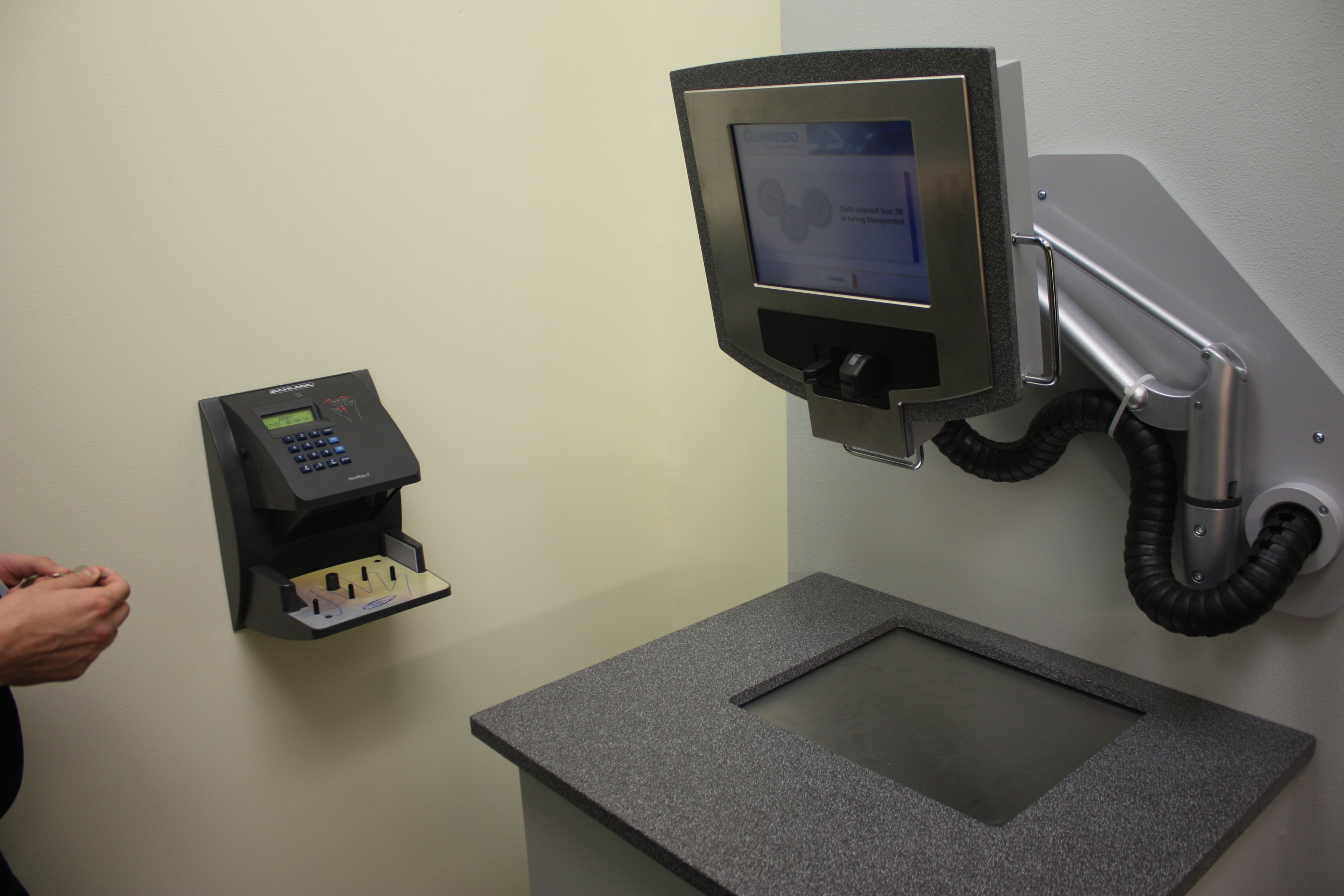The terminal requires four types of identification before revealing the customer's box under a sliding panel in the counter below the screen. SunTrust hopes the automated system will save money and space and appeal to customers who prefer self-service options.