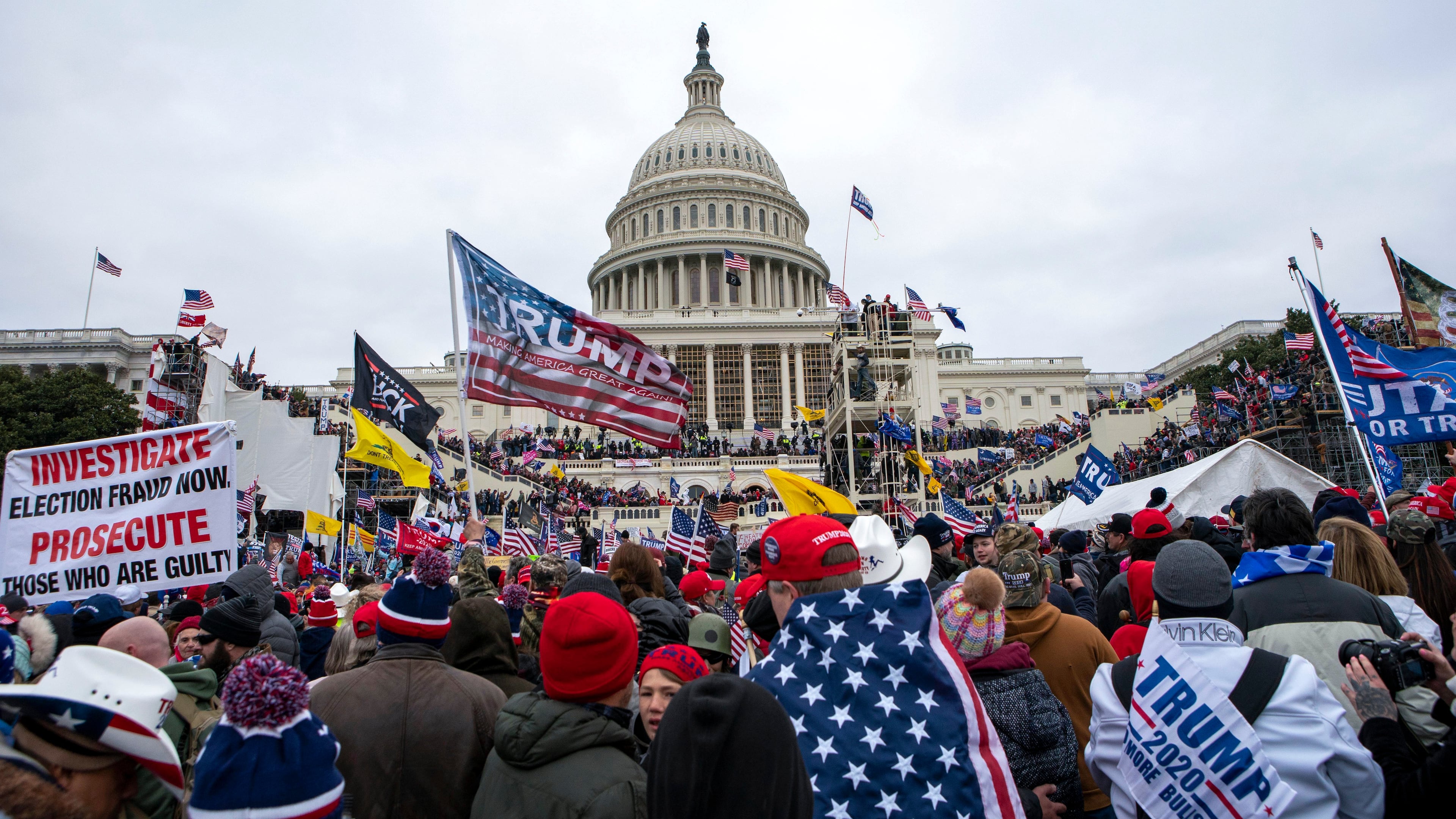 FILE - Rioters loyal to President Donald Trump rally at the U.S. Capitol in Washington, Jan. 6, 2021. (AP Photo/Jose Luis Magana, File)