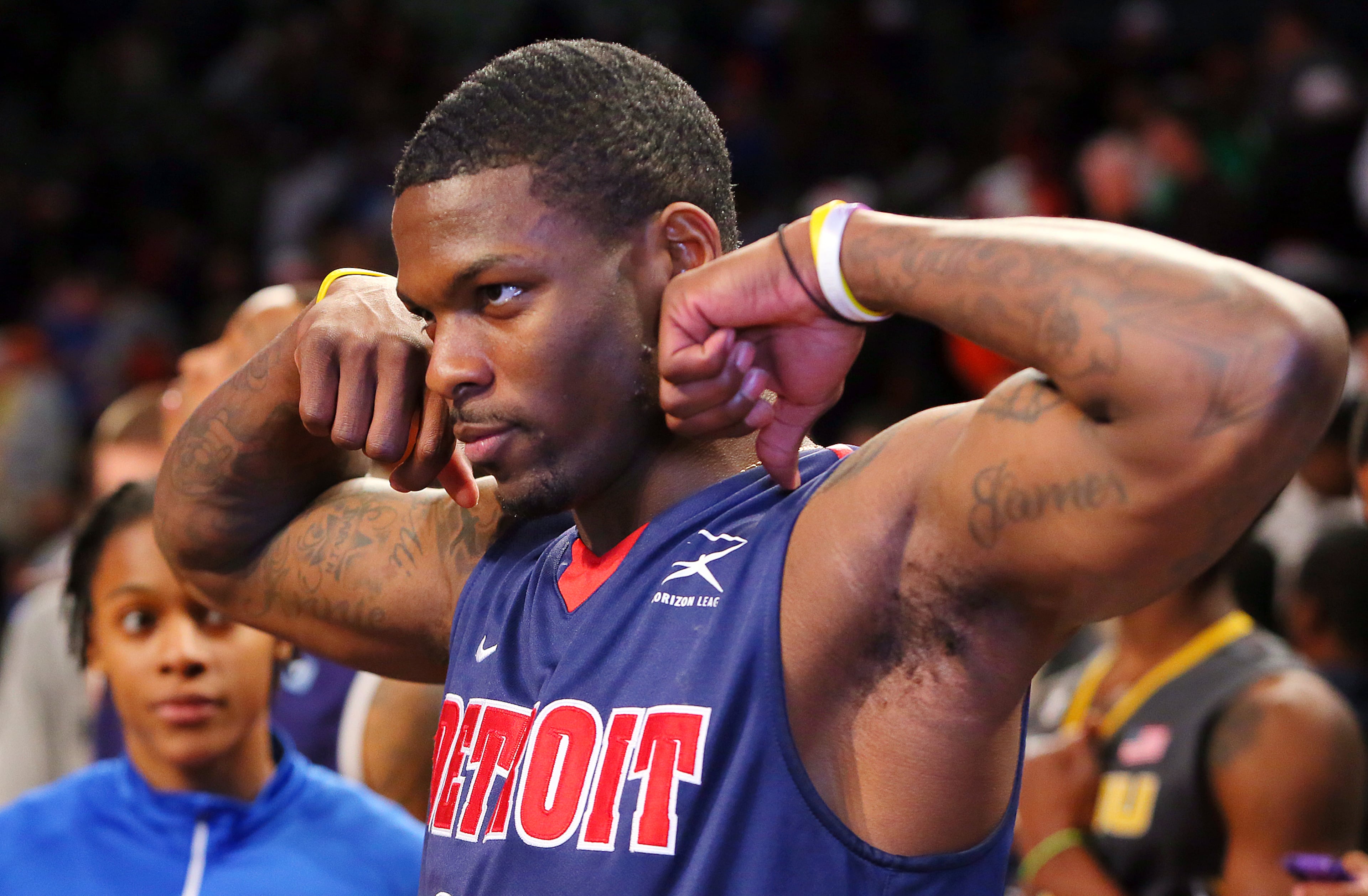 Doug Anderson, University of Detroit Mercy, flexes his muscles after winning the Slam Dunk Championship at the 25th annual State Farm College Slam Dunk & 3-Point Championships at McCamish Pavilion on Thursday, April 4, 2013, in Atlanta. CURTIS COMPTON / CCOMPTON@AJC.COM