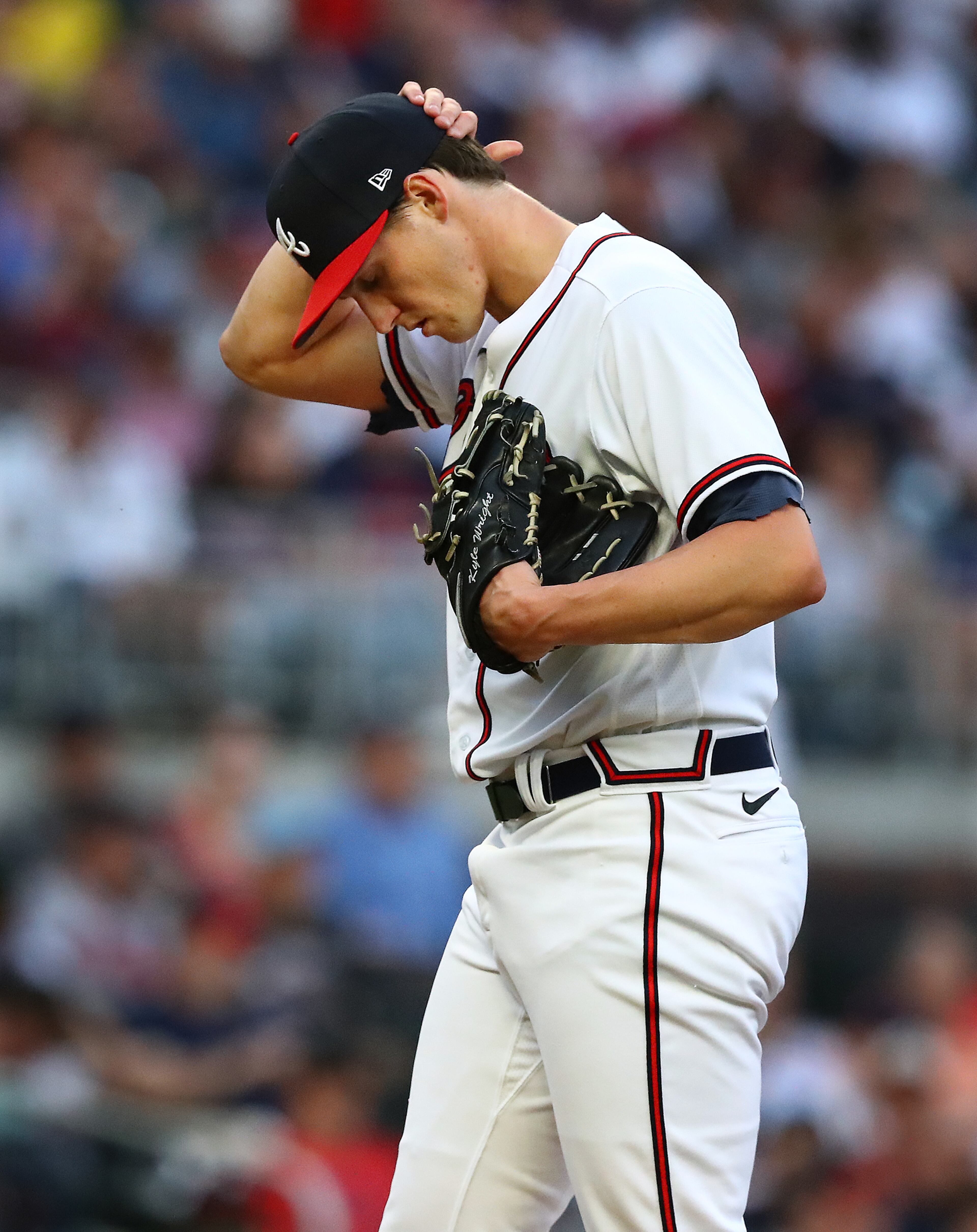 051022 Atlanta: Atlanta Braves starting pitcher Kyle Wright reacts to giving up a grand slam to Boston Red Sox Rafael Deavers during the second inning of a MLB baseball game on Tuesday, May 10, 2022, in Atlanta. “Curtis Compton / Curtis.Compton@ajc.com”