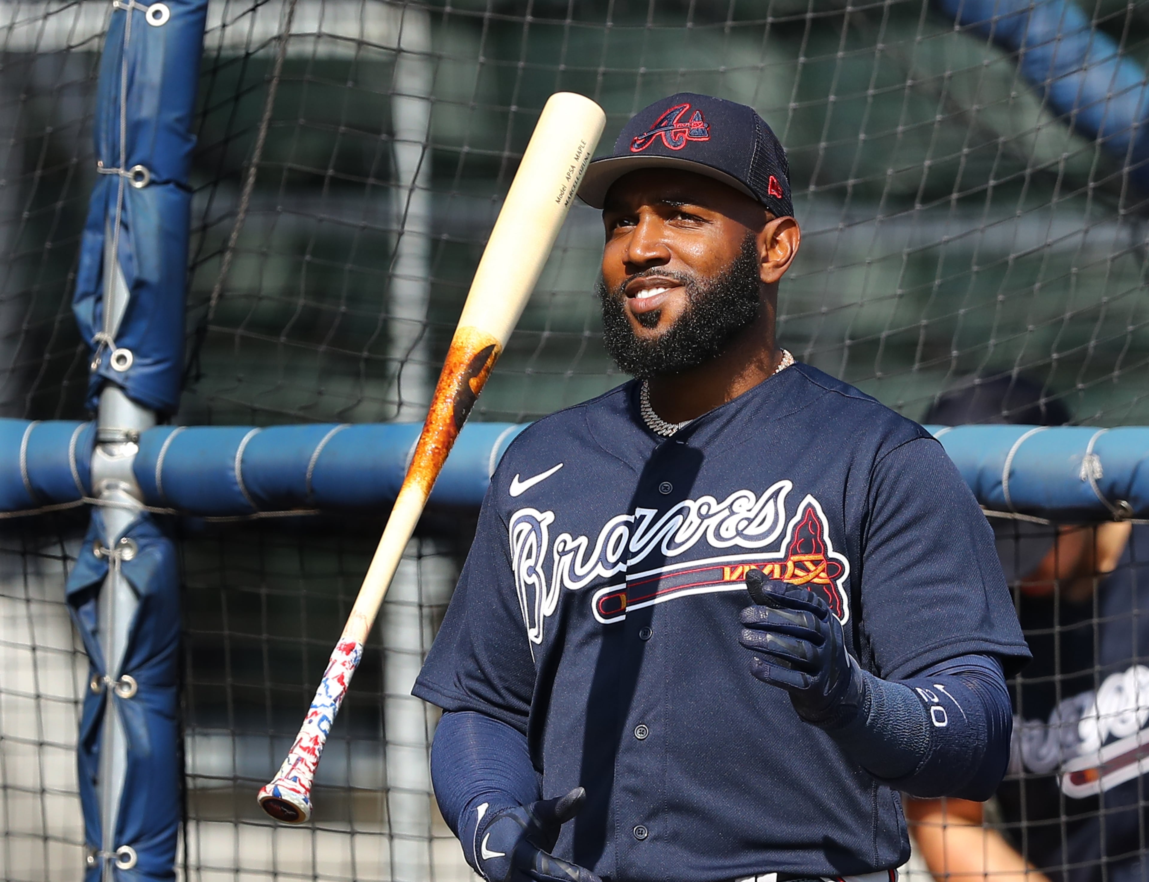 Braves outfielder Marcell Ozuna flips his bat after hitting one over the wall during batting practice at spring training in CoolToday Park on Tuesday, March 15, 2022, in North Port, Fla. “Curtis Compton / Curtis.Compton@ajc.com”