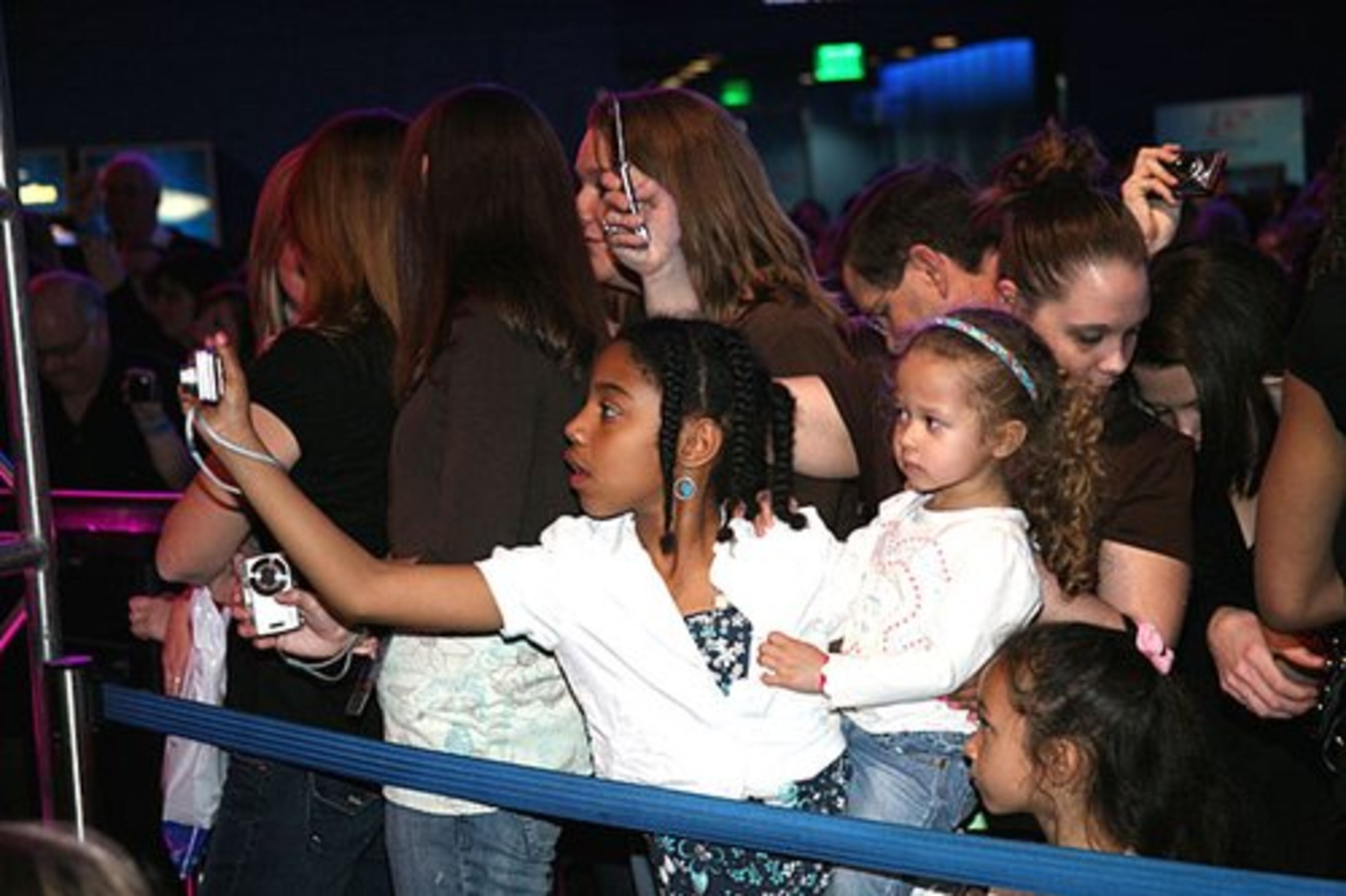 Attendees and their families crowded into the Aquarium's main atrium for the concert.