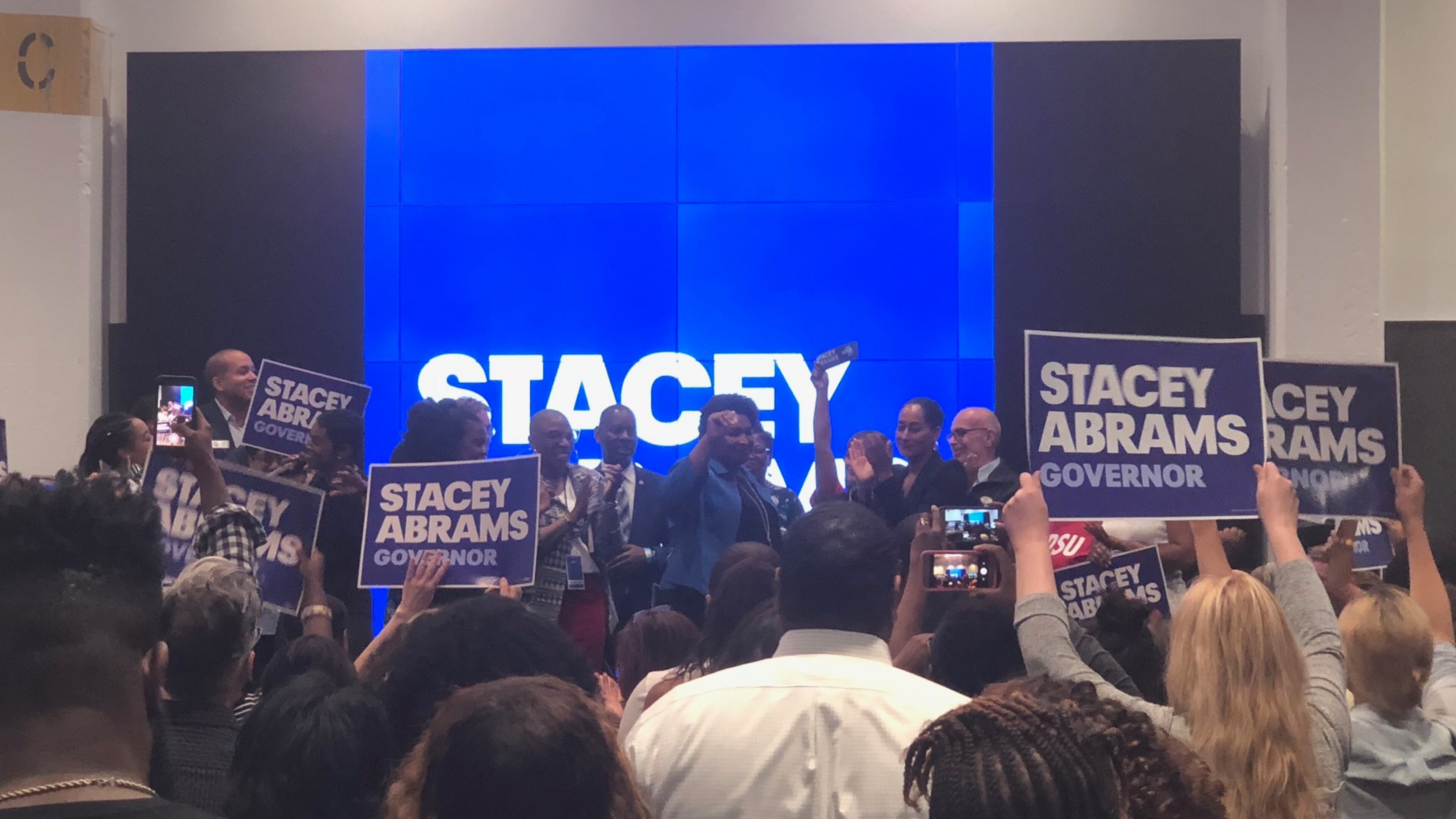 Stacey Abrams appears with a quartet of TV stars as early voting begins. AJC photo.