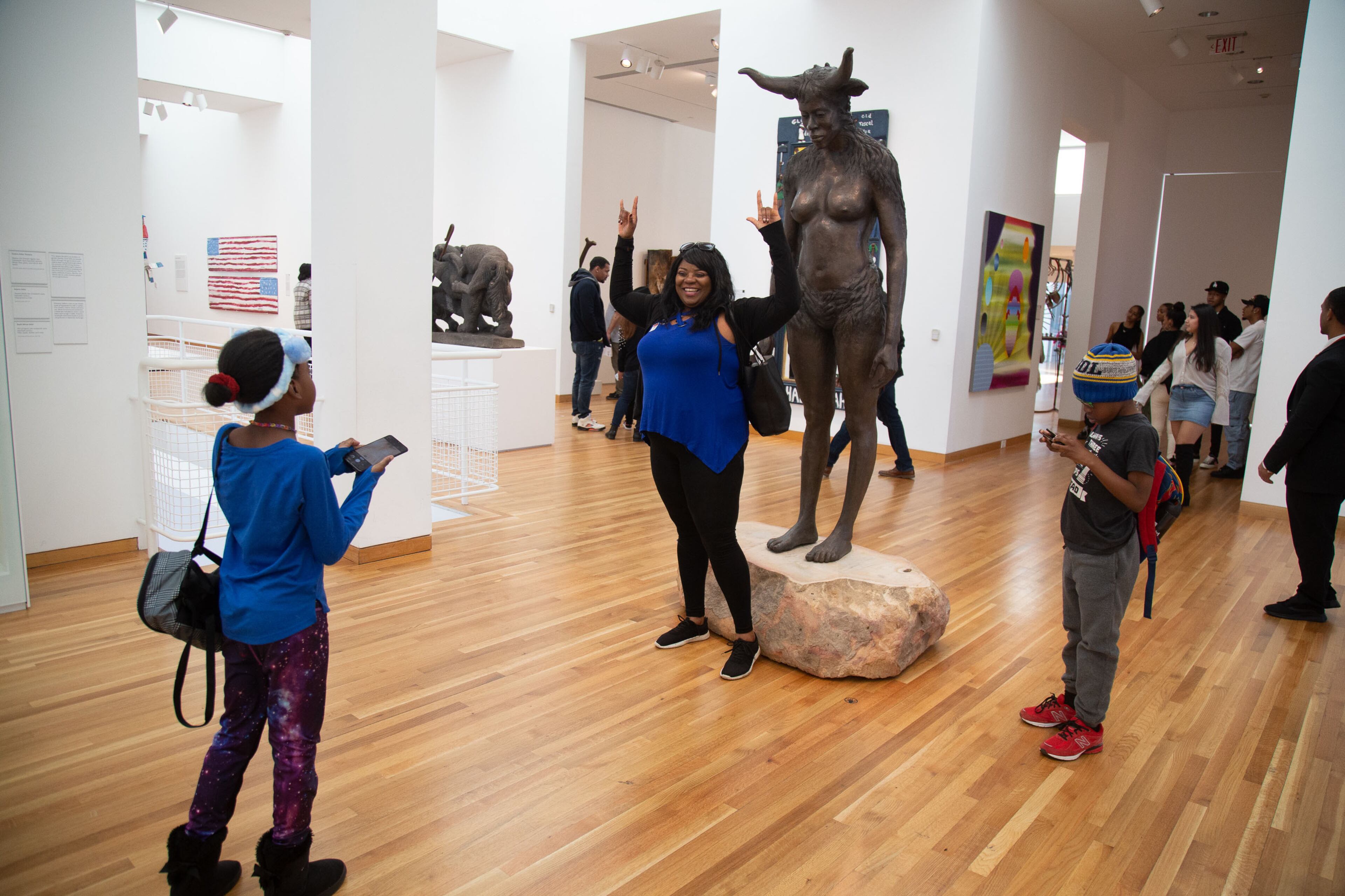 Tori Antem take a photograph in front of one of the during the Woodruff Family Fun Fest at the Woodruff Arts Center in Atlanta on Sunday, January 12, 2020. STEVE SCHAEFER / SPECIAL TO THE AJC