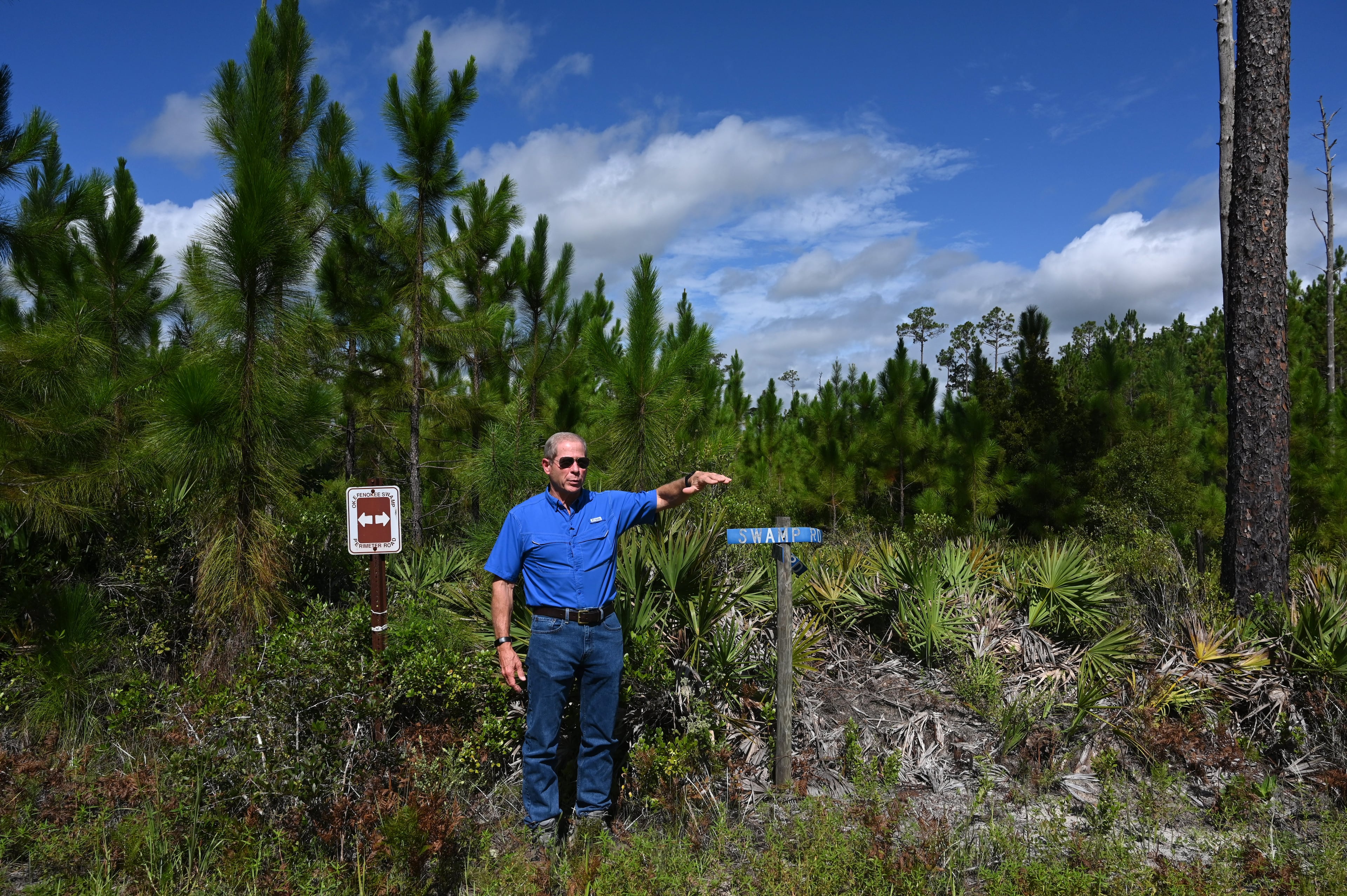 Joe Hopkins, president of Toledo Manufacturing, speaks as he stands on land his company owns near the Okefenokee Swamp on Monday, August 11, 2025. Hopkins supports mining near the Okefenokee — if it can be proven it won't harm the swamp. (Hyosub Shin/AJC)