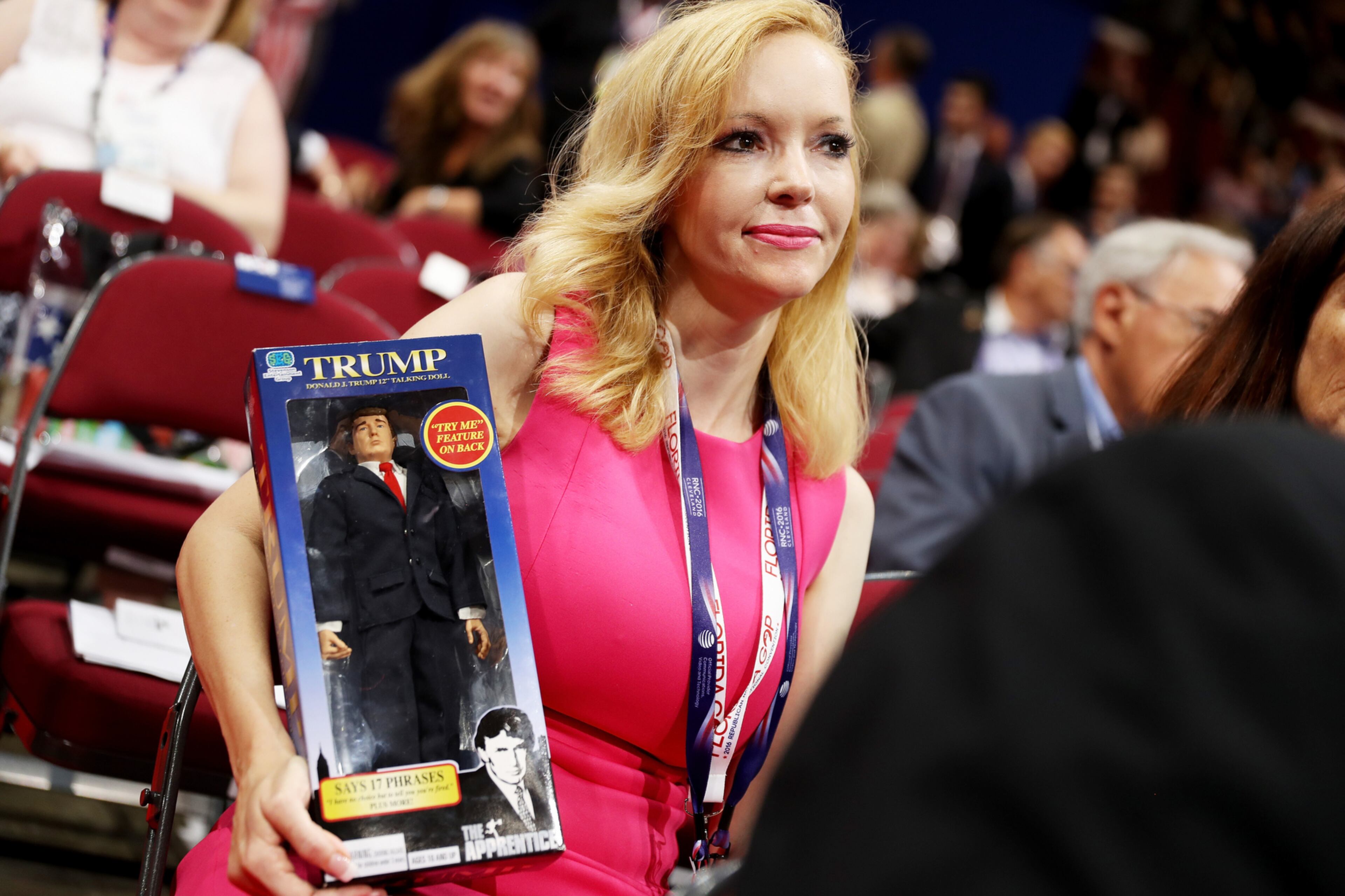 CLEVELAND, OH - JULY 18: Florida delegate Dana Dougherty holds a Donald Trump doll during the first day of the Republican National Convention on July 18, 2016 at the Quicken Loans Arena in Cleveland, Ohio. An estimated 50,000 people are expected in Cleveland, including hundreds of protesters and members of the media. The four-day Republican National Convention kicks off on July 18. (Photo by Joe Raedle/Getty Images)