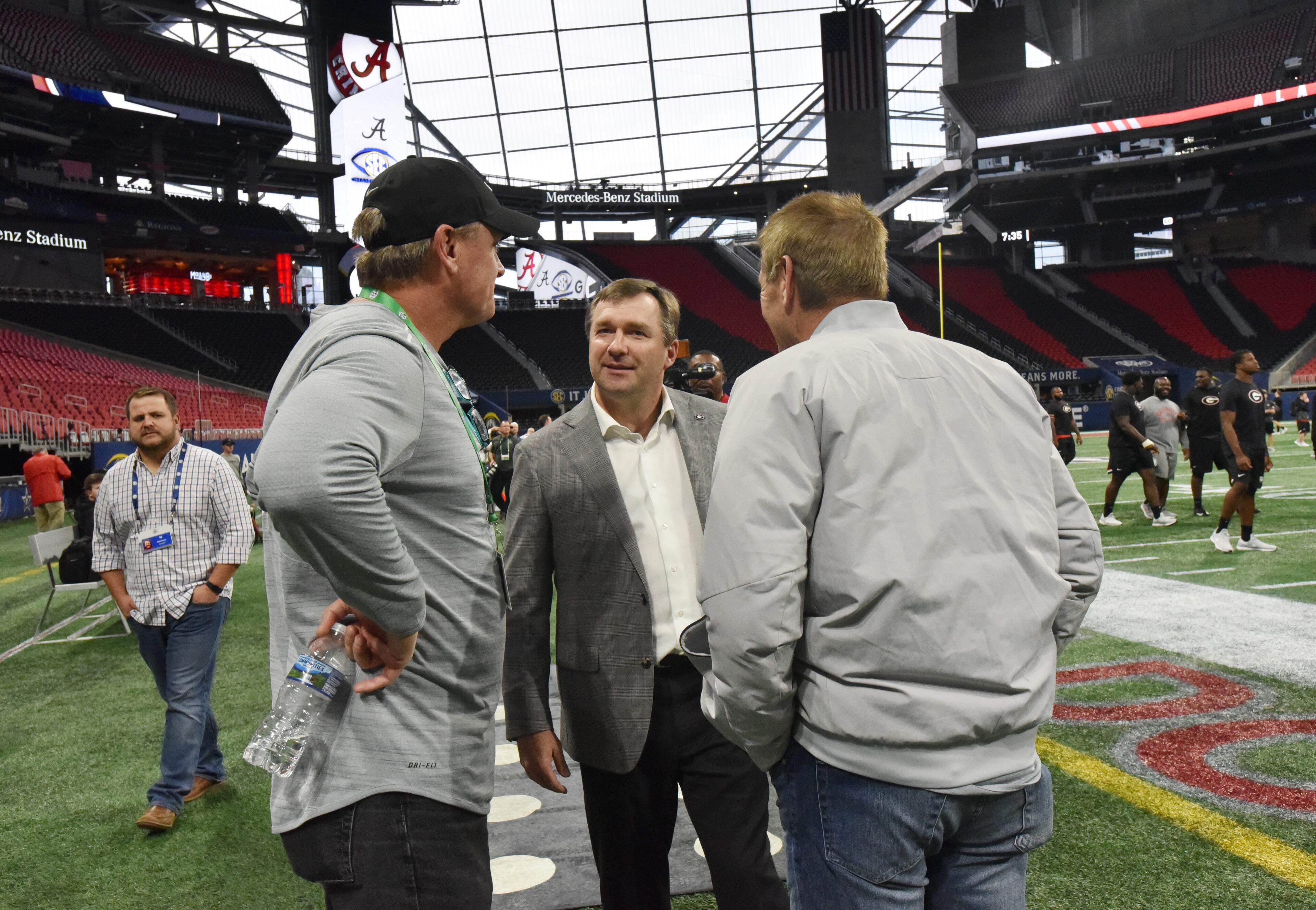 November 30, 2018 Atlanta - Georgia head coach Kirby Smart talks with guests during their team practice at Mercedes-Benz Stadium on Friday, November 30, 2018. HYOSUB SHIN / HSHIN@AJC.COM