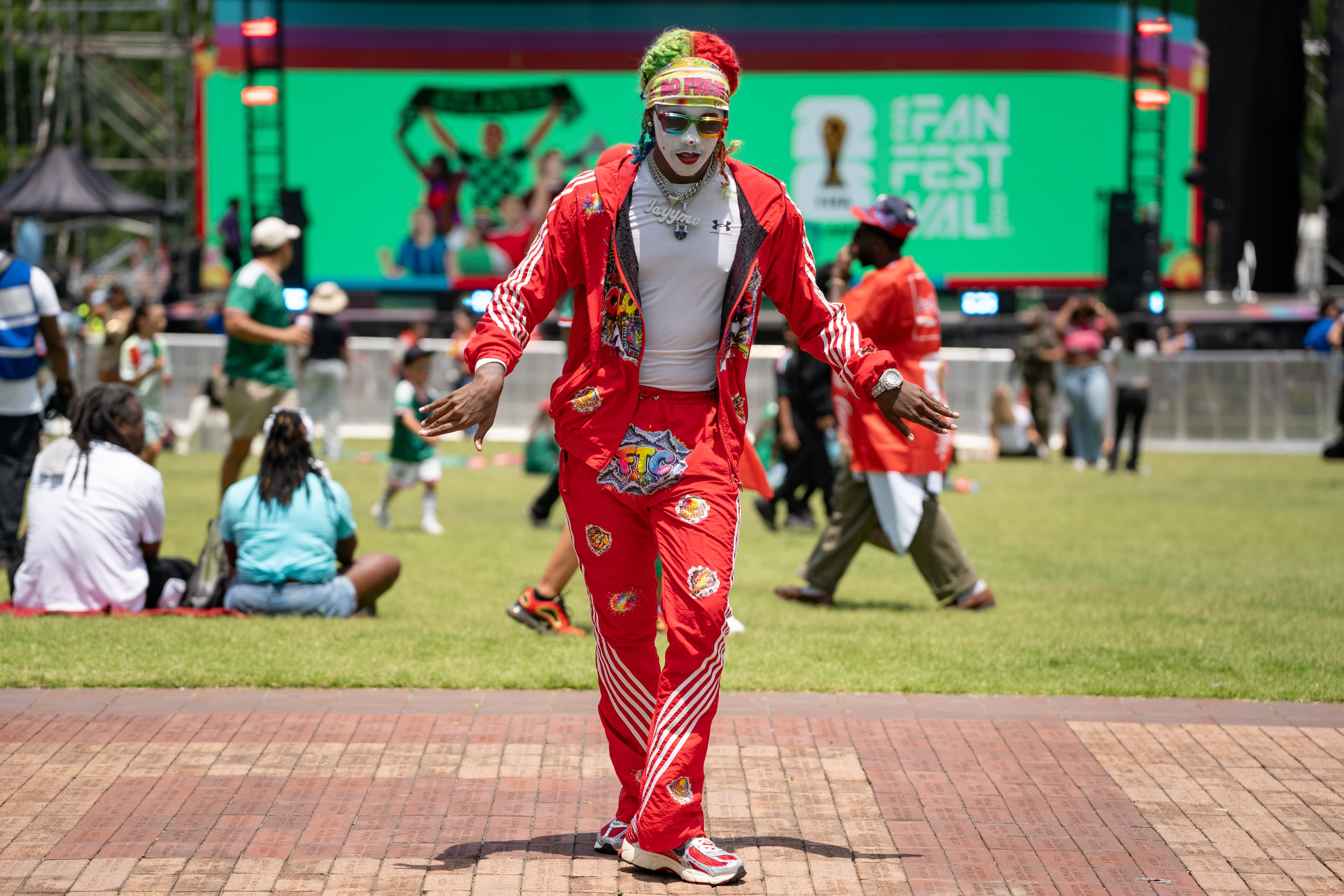 A Fresh the Clown performer dances during the opening day of the FIFA Fan Festival at Centennial Olympic Park on Thursday, June 11, 2026. (Ben Hendren for the AJC)