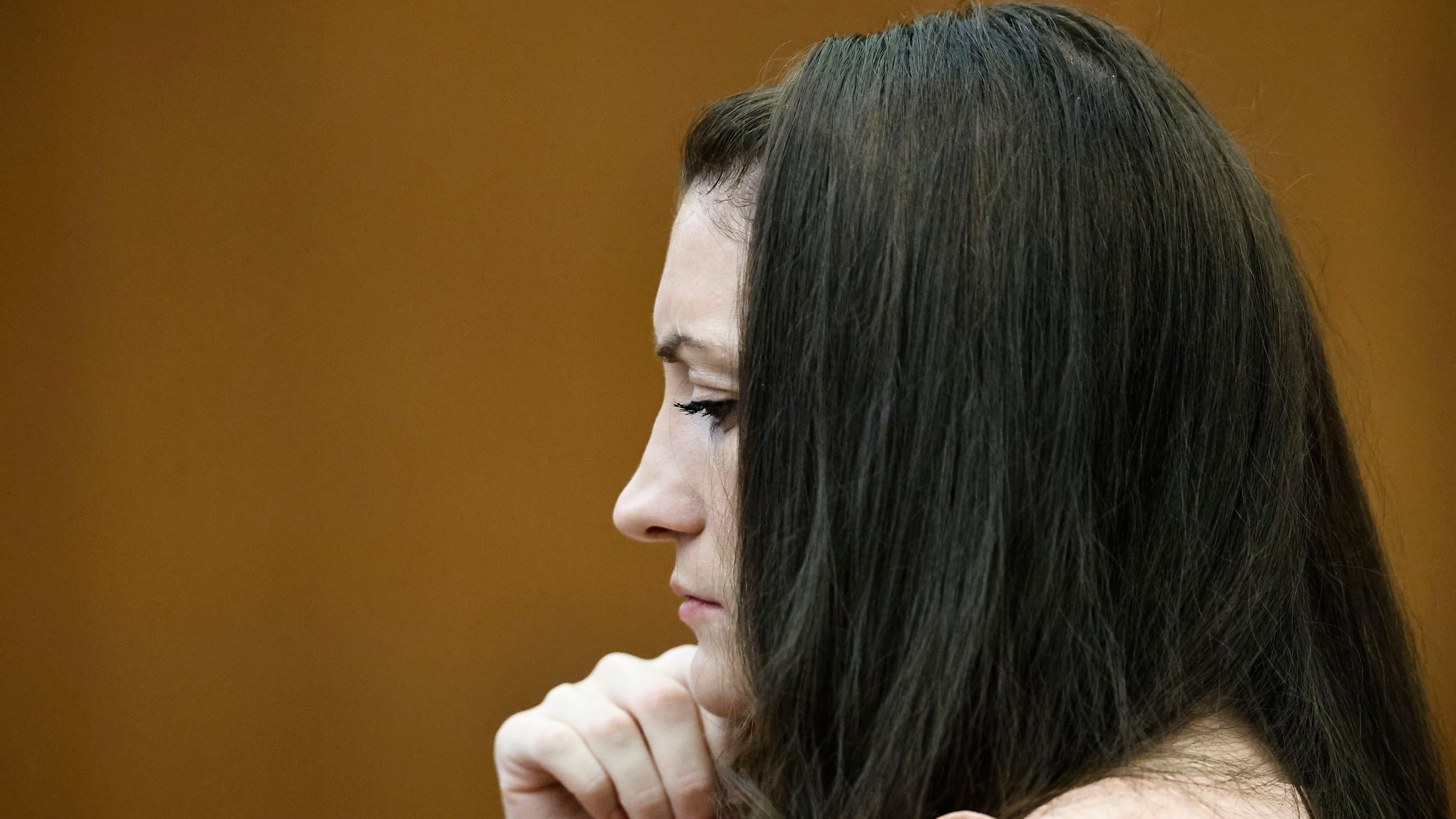 Defendant Lindsay Clancy wipes away tears as she listens to testimony during the Lindsay Clancy murder trial in Plymouth Superior Court, Plymouth, Mass., on Tuesday, Aug. 25, 2026. (Greg Derr/The Patriot Ledger via AP, Pool)