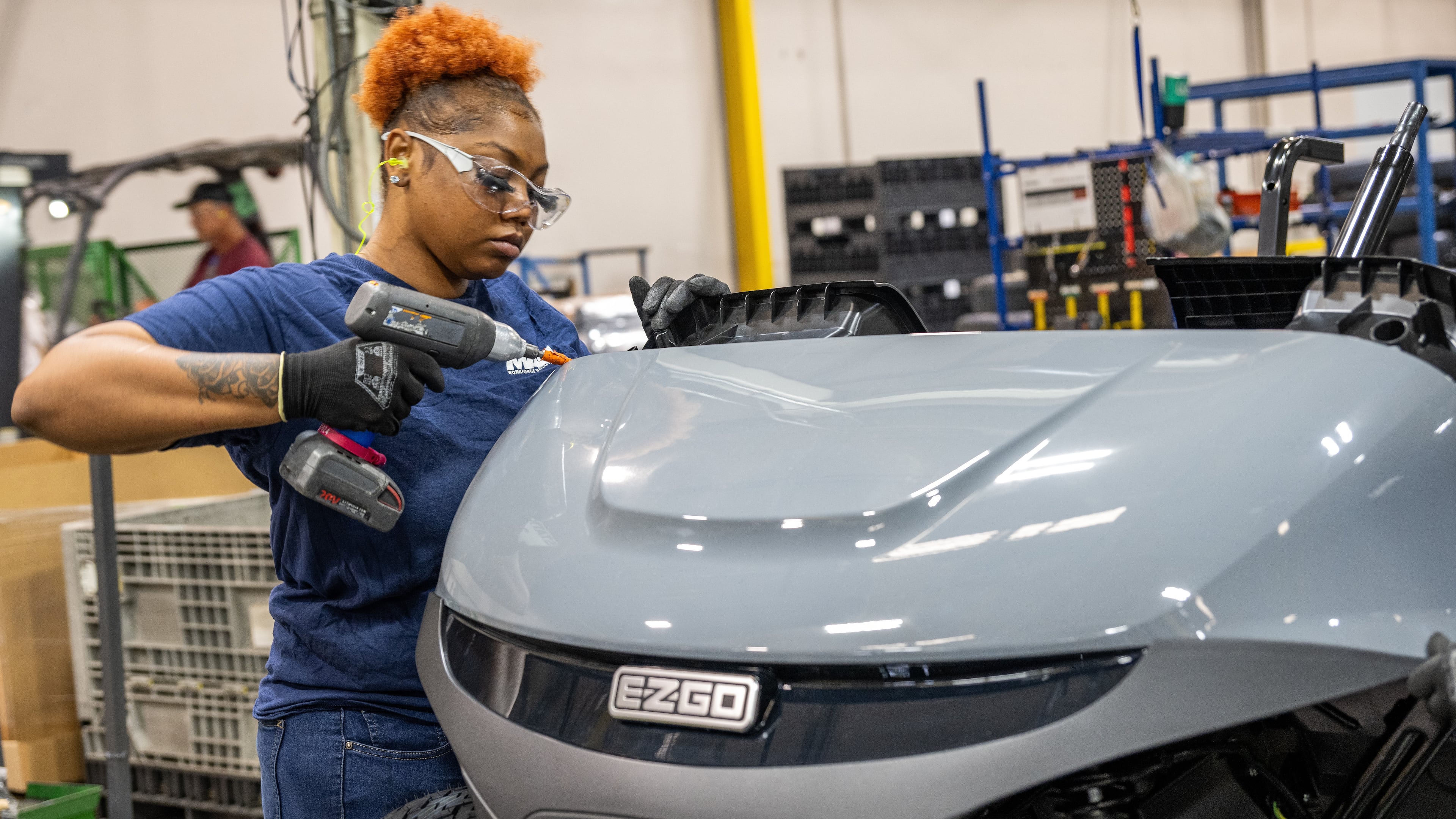 Two Georgia companies have asked for a 100% tariff on imported golf carts, arguing that the Chinese imports unfairly undercut them. The Biden administration has extended some tariffs, but rejected former President Donald Trump's much more aggressive approach. Here, a worker at Textron's Augusta-area plant works on a new golf cart. (Courtesy of Brent Cline)
