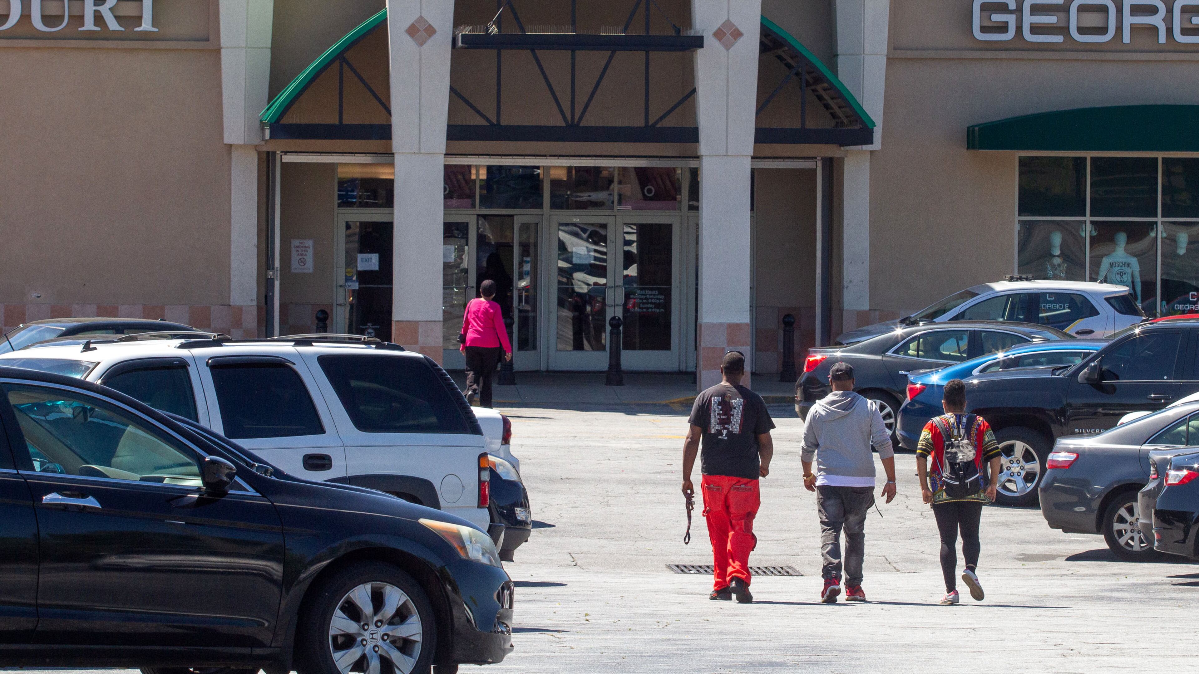 People make their way into the Greenbriar Mall in southwest Atlanta on Friday, May 1, 2020. STEVE SCHAEFER / SPECIAL TO THE AJC