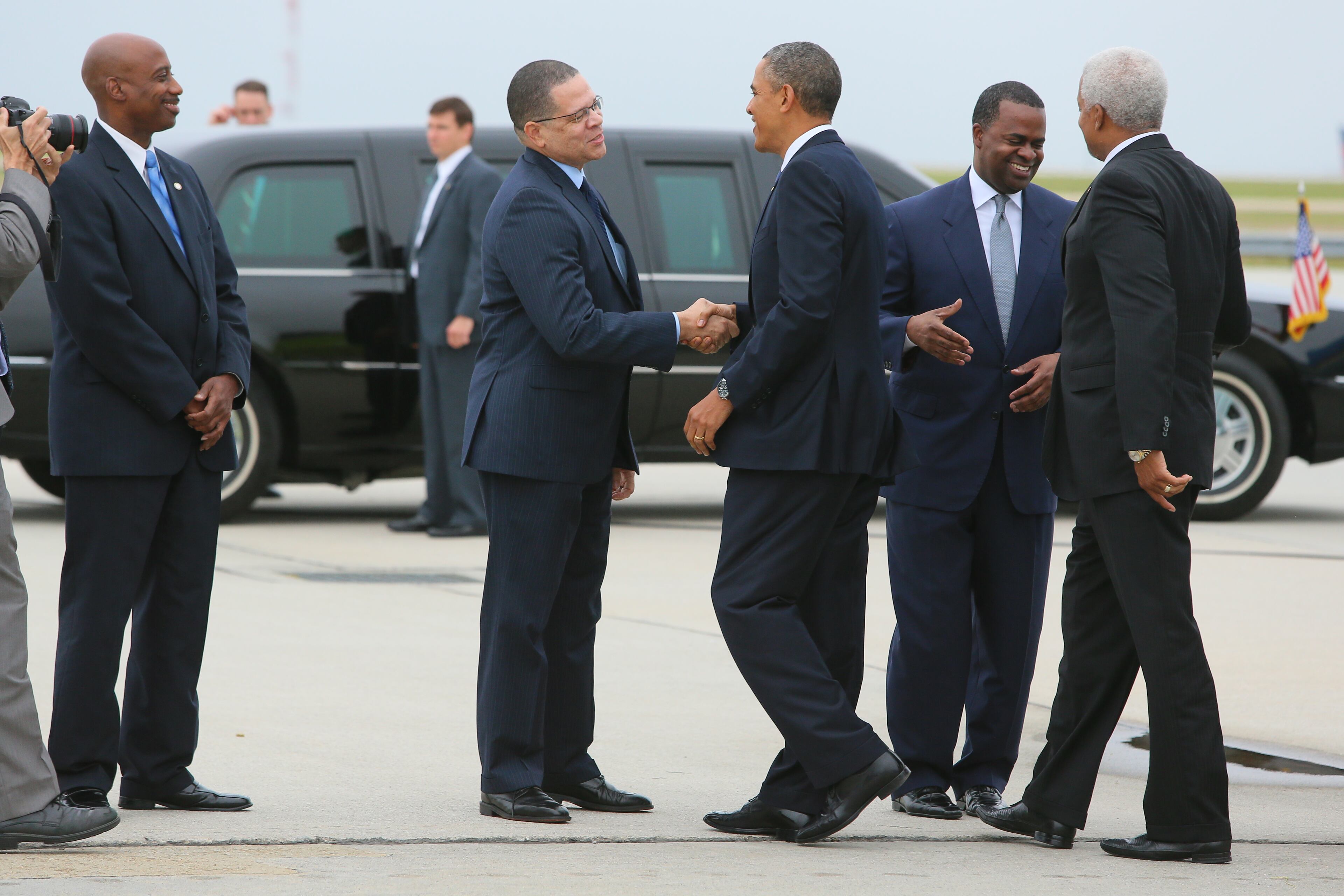 Local dignitaries greet President Obama as he arrives in Atlanta.
