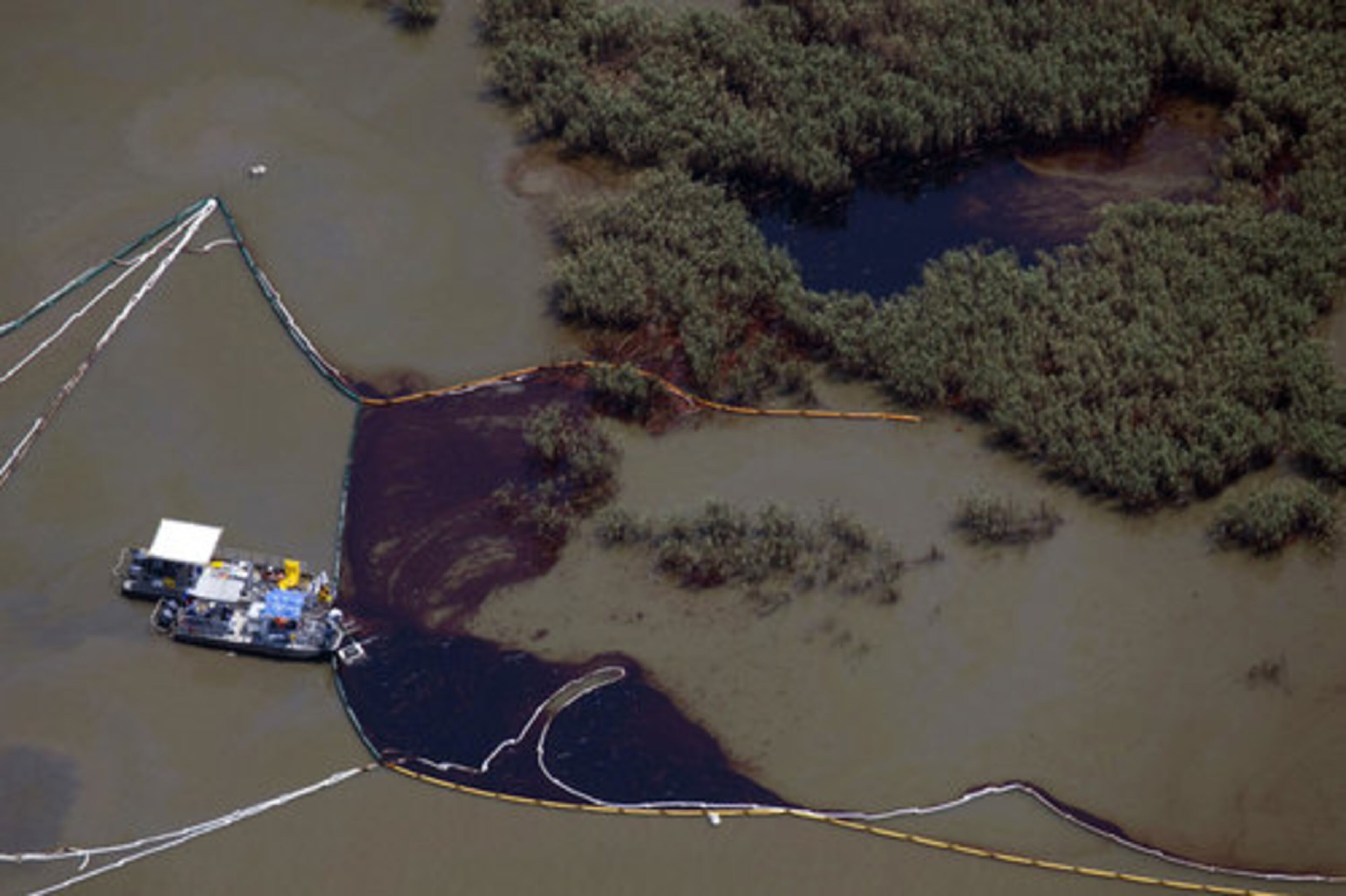 April 20, Gulf of Mexico - An explosion on the Deepwater Horizon offshore rig left 17 workers injured and 11 missing and presumed dead. Oil began spilling from a well 5,000 feet below sea level, discharging millions of gallons of crude into the Gulf and threatening fragile marshes on the Louisiana coast and wildlife across the sea.
