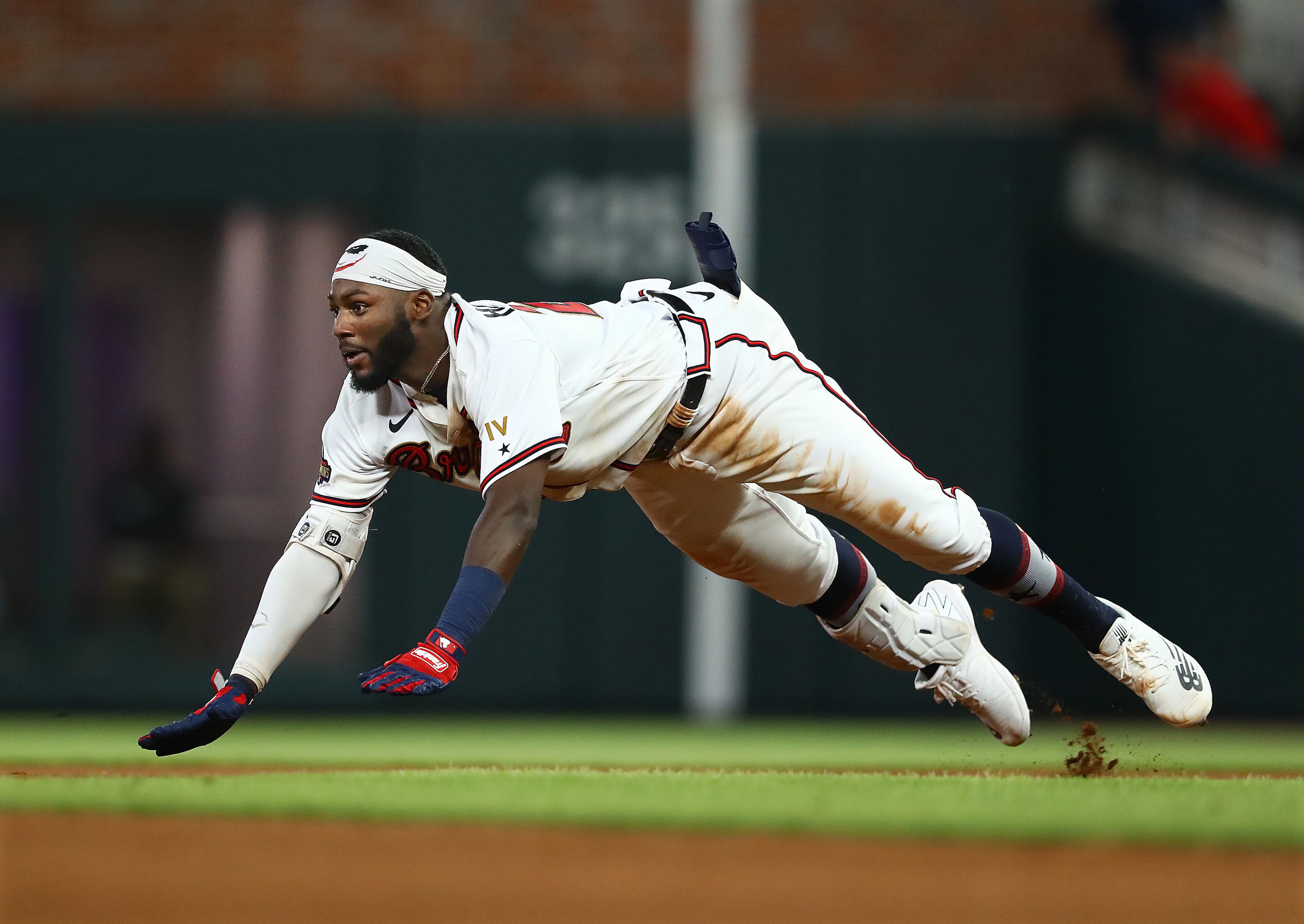 Atlanta Braves outfielder Michael Harris goes headfirst into second base for a double against the Oakland Athletics during the seventh inning of an MLB game on Wednesday, June 8, 2022, in Atlanta. The Braves beat the Athletics 13-2. (Curtis Compton / Curtis.Compton@ajc.com)
