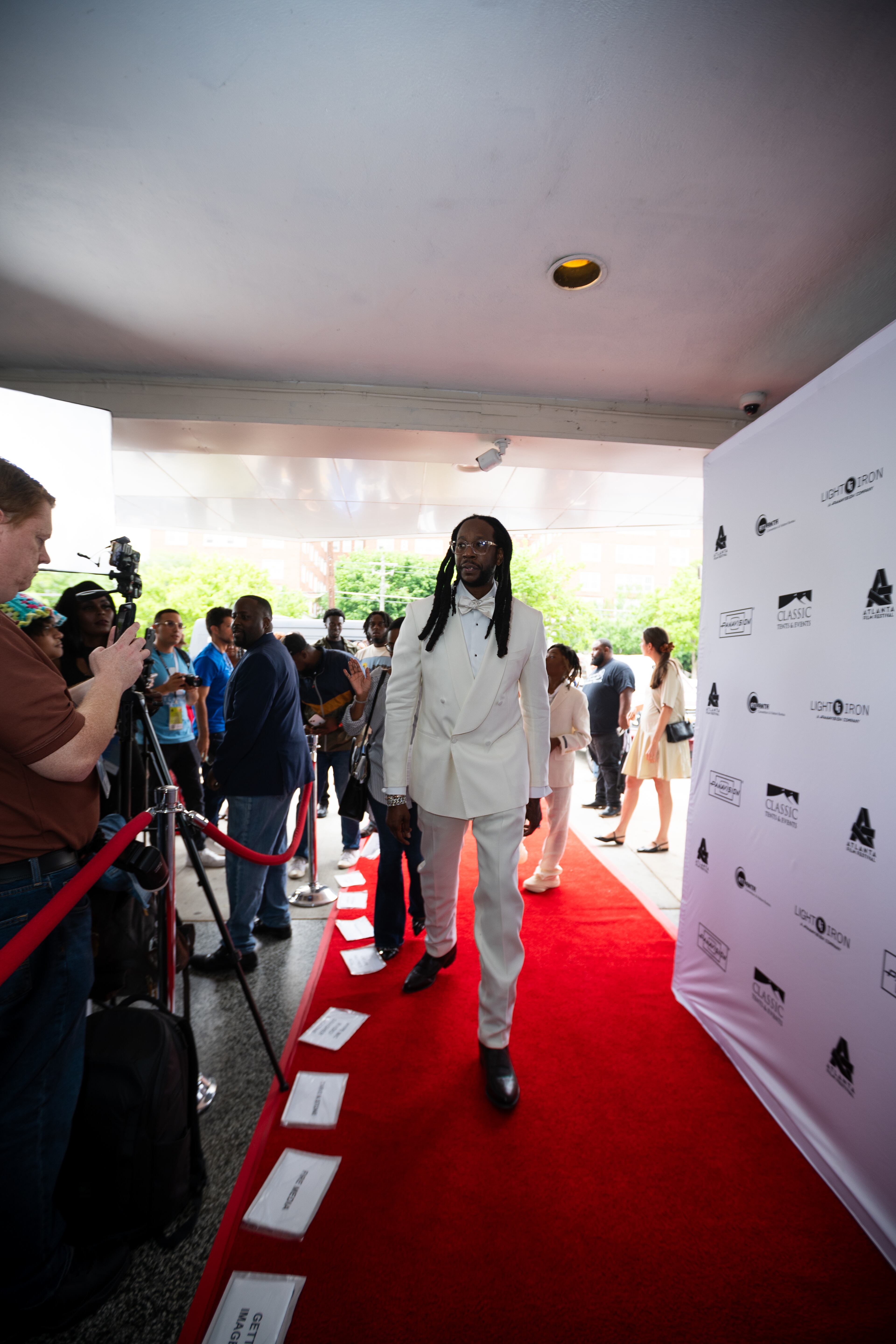 Rapper 2 Chainz walks the red carpet into the Atlanta Film Festival on Saturday, May 3, 2025, at the Plaza Theatre before a screening of his short film "Red Clay," which was inspired by his life growing up in College Park. (Courtesy of Shaddai Peña)