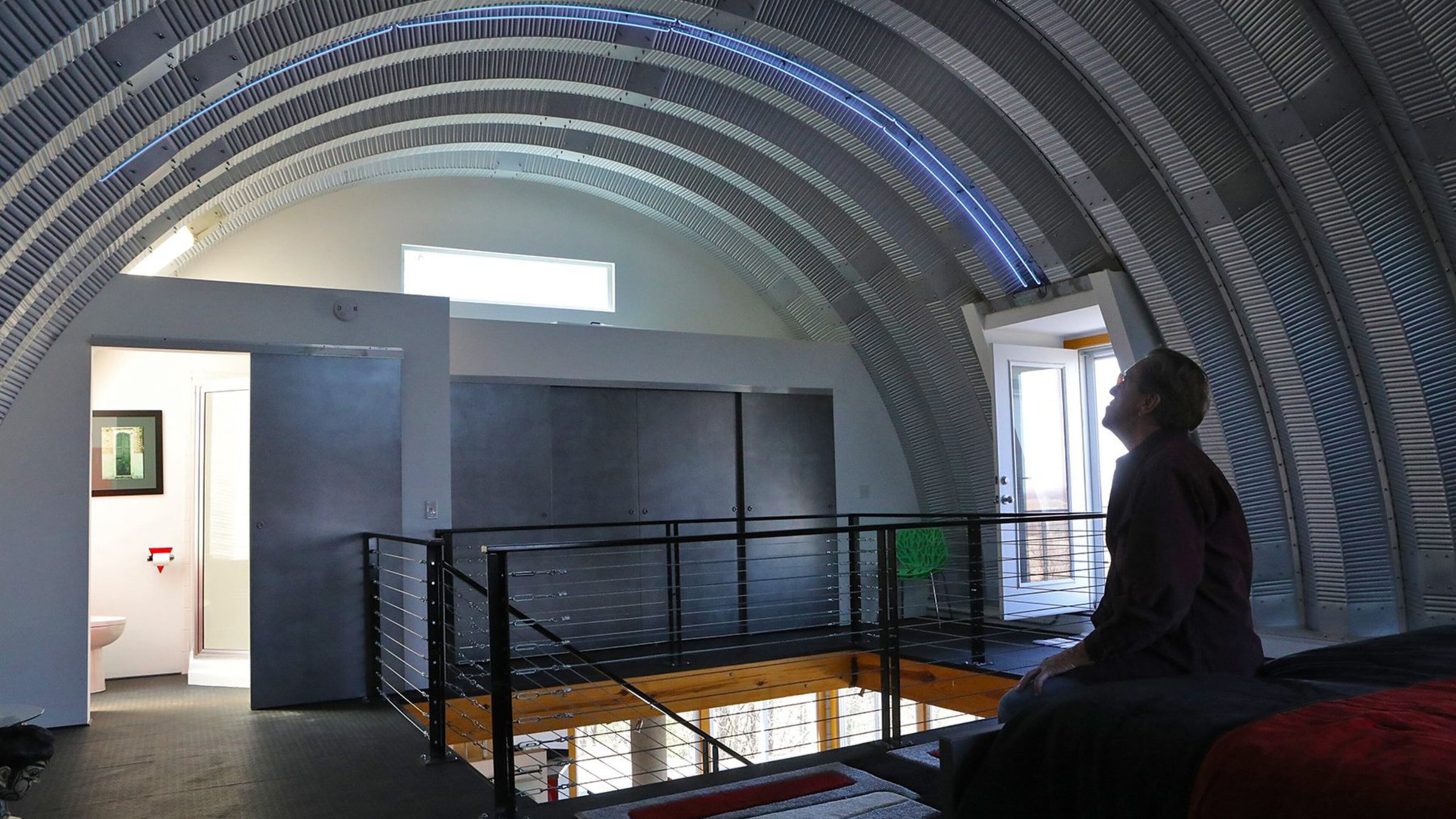 The bedroom has a corrugated metal roof with blue neon lights on Thursday, April 12, 2018, at the home of Dennis Wick in Caseyville, Mo. (J.B. Forbes/St. Louis Post-Dispatch/TNS)
