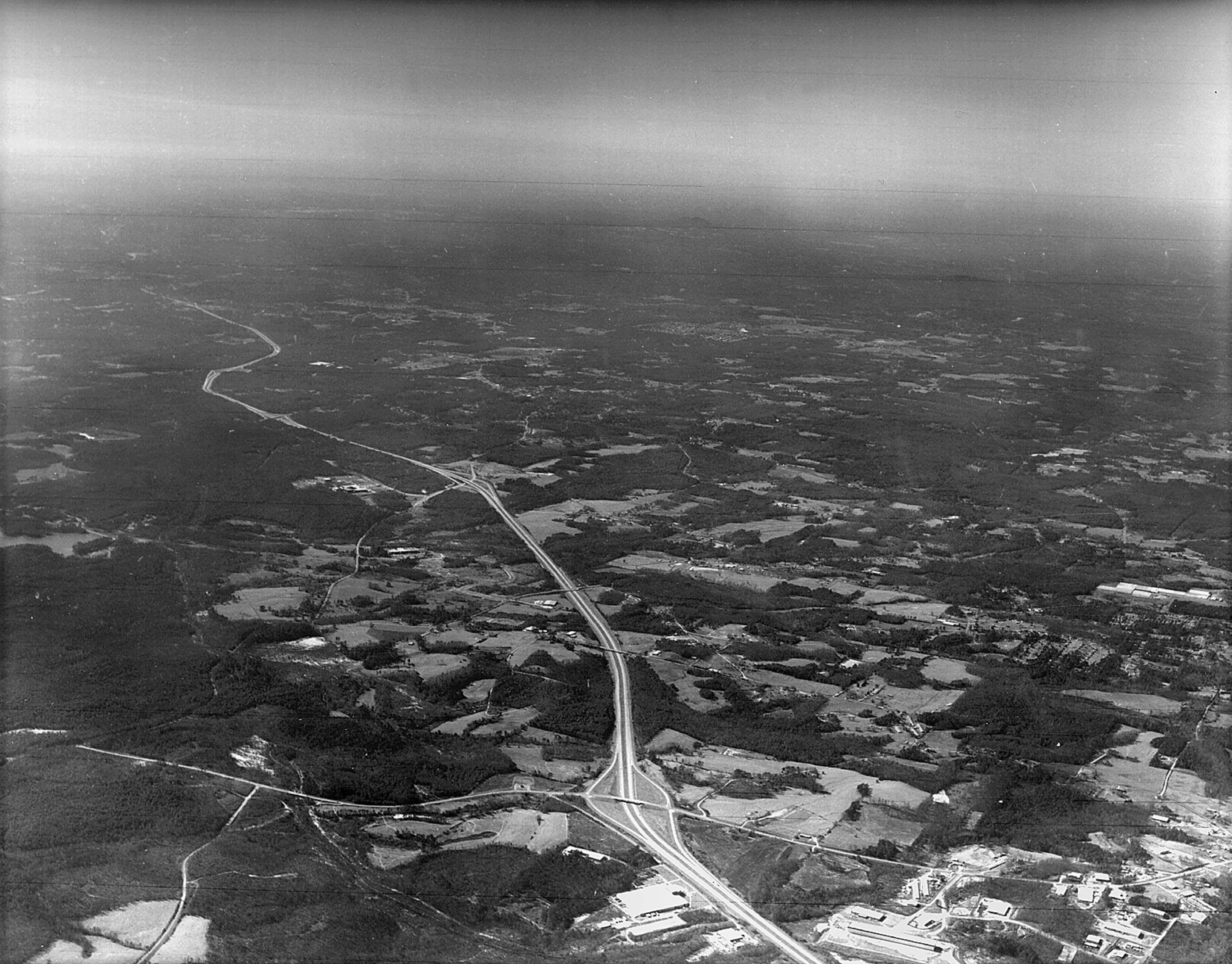 1985 aerial view of south Forsyth County. This view is looking southwest with Ga. 400 in the center. (Special to the AJC/DILLON-REYNOLDS Aerial Photography, Inc.) 1-22-85