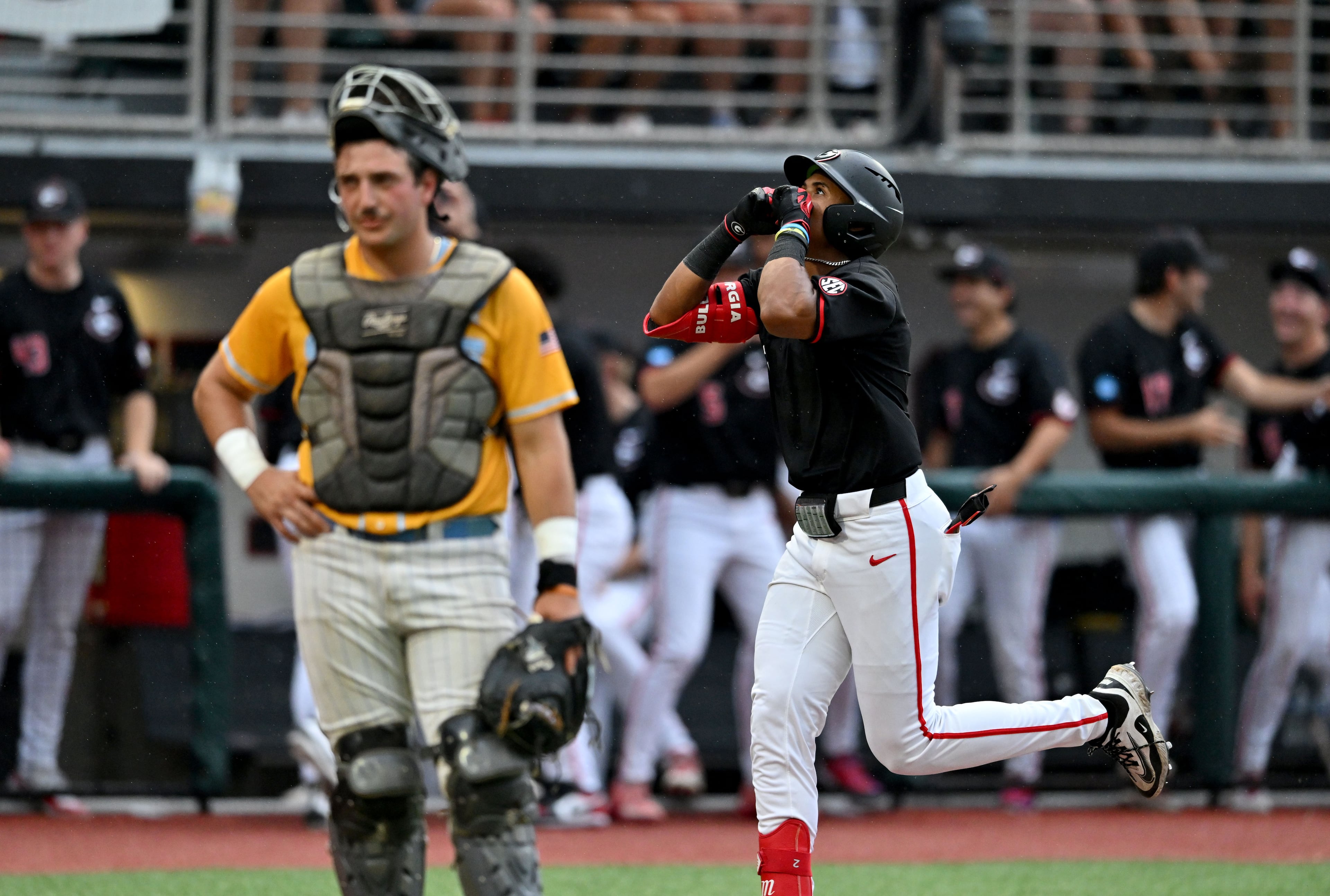 Georgia infielder Ryan Black (2) celebrates as he circles the bases on a solo home run during the fifth inning of their NCAA Regional game at Foley Field, Friday, May 29, 2026, in Athens. (Hyosub Shin/AJC)