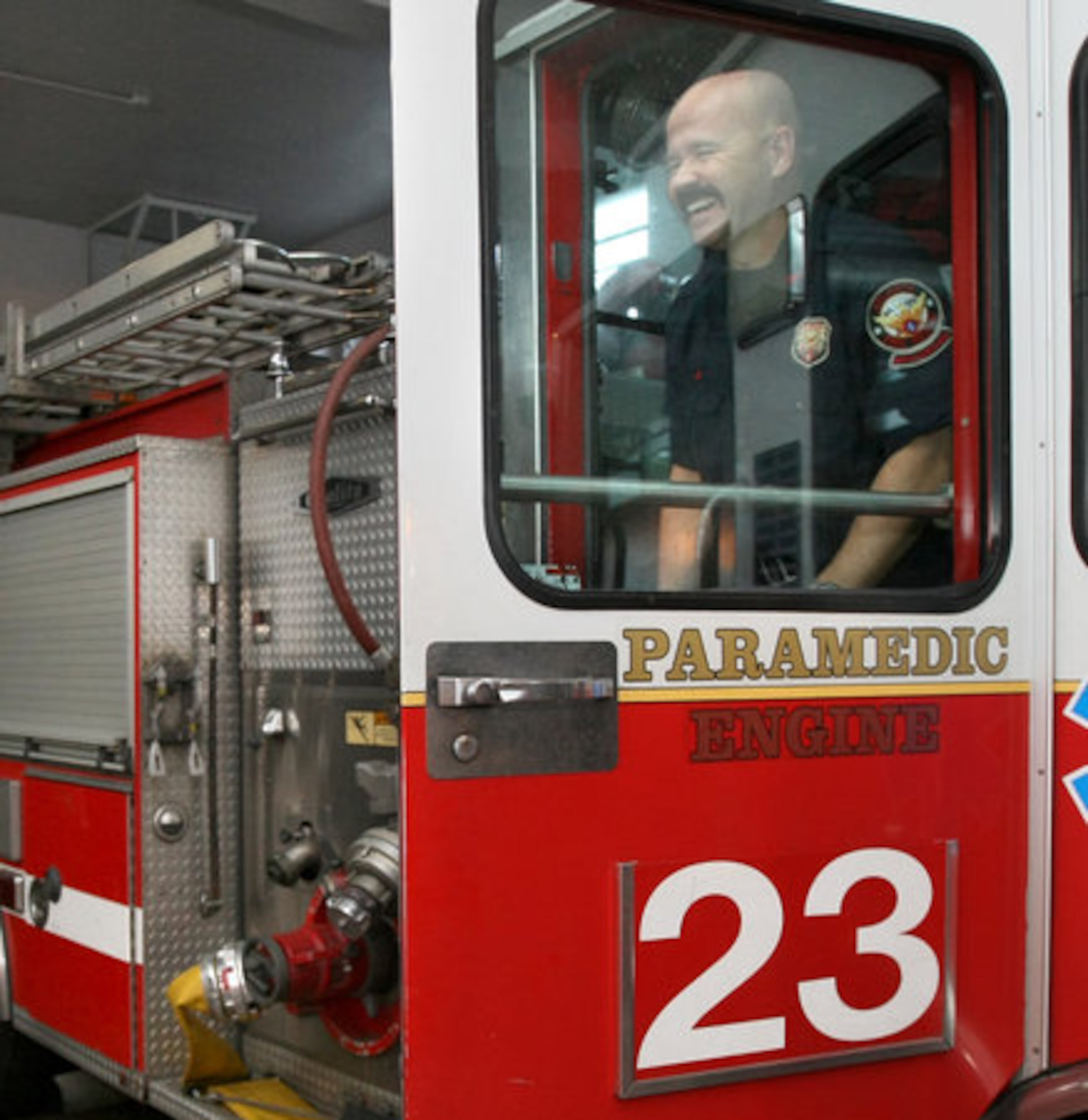 Glad to be back in the house, Atlanta firefighter, Jeff Hays laughs after a remark from one of his fellow firefighters.