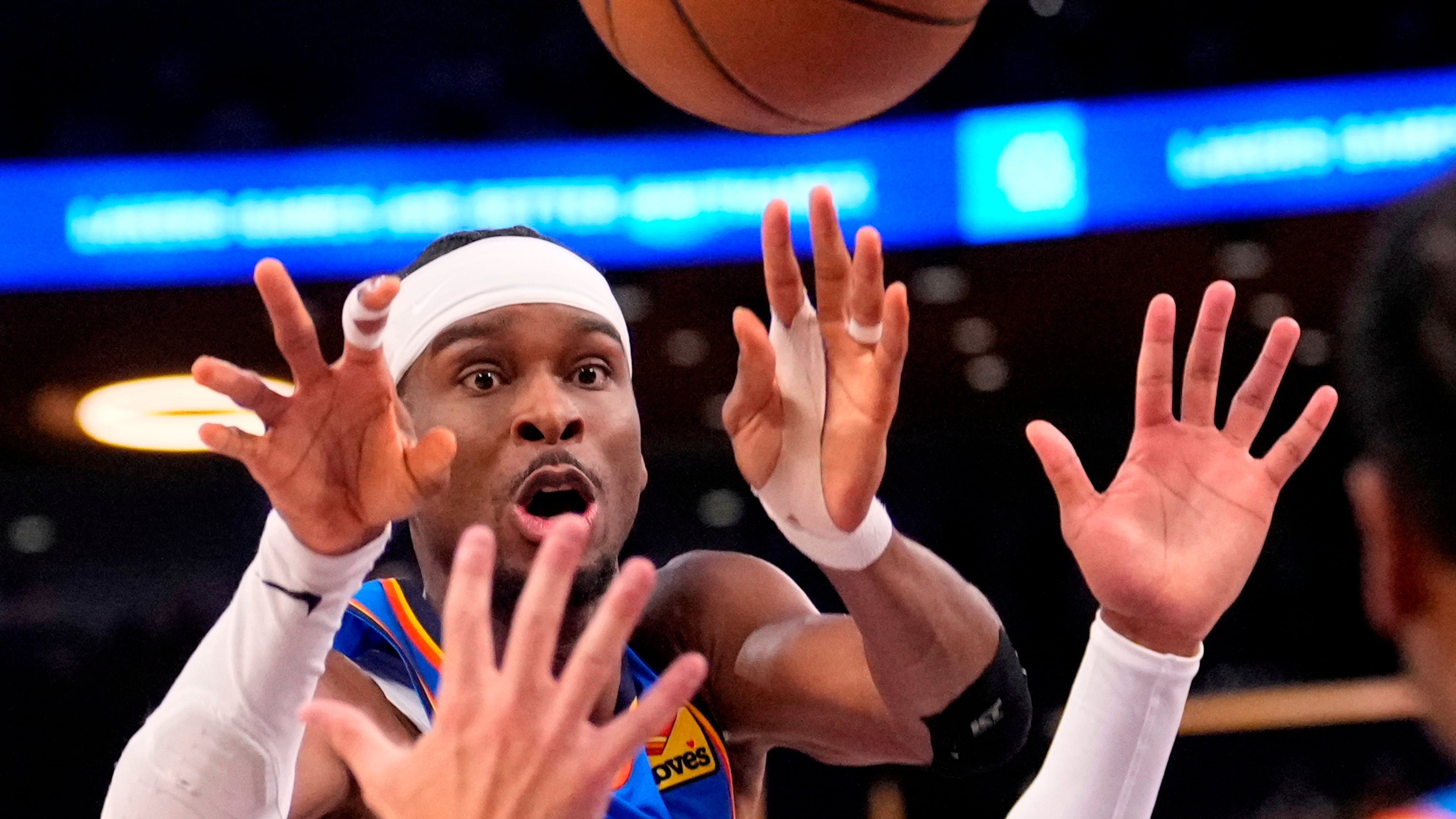 Oklahoma City Thunder guard Shai Gilgeous-Alexander passes the ball during the second half of Game 3 in a second-round NBA basketball playoffs series against the Los Angeles Lakers, Saturday, May 9, 2026, in Los Angeles. (AP Photo/Mark J. Terrill)
