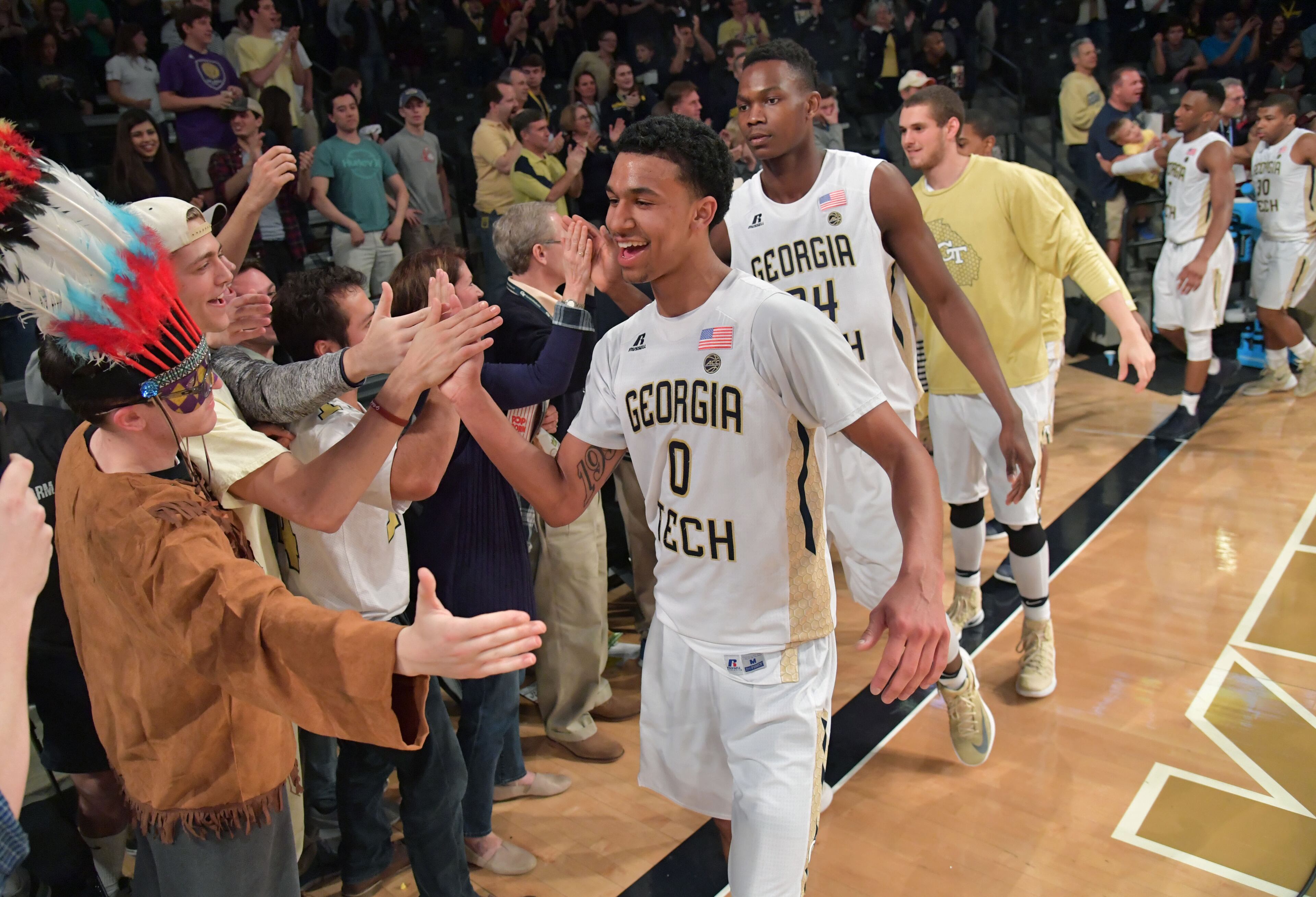 February 11, 2017 Atlanta - Georgia Tech's guard Justin Moore (0) and other team members celebrate after Georgia Tech defeated the Boston College at McCamish Pavilion on Saturday, February 11, 2017. HYOSUB SHIN / HSHIN@AJC.COM