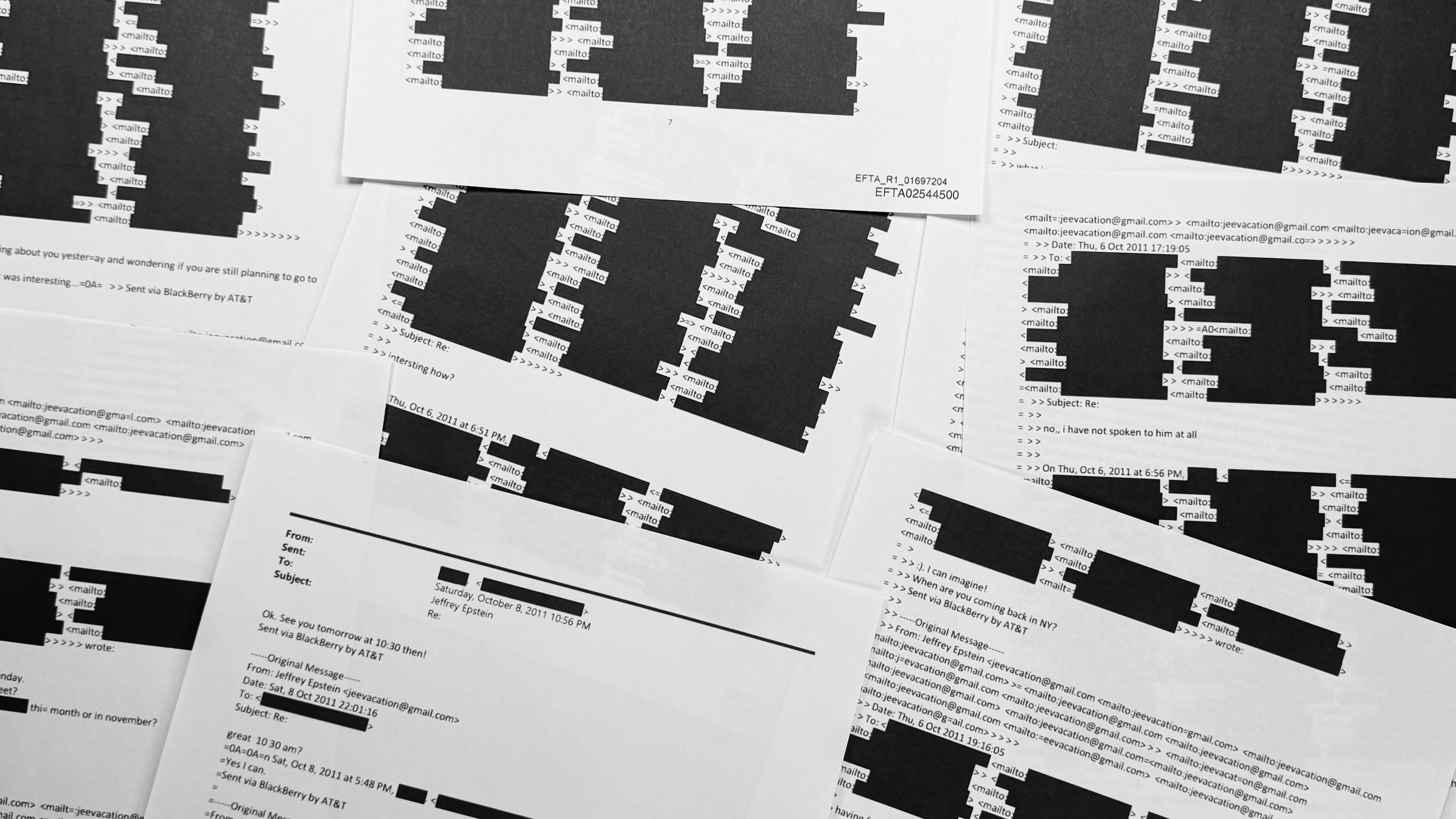 A document with an email chain from Jeffrey Epstein illustrates the amount of redactions of personally identifiable information that the U.S. Department of Justice was required to do before release of Epstein documents, is photographed Sunday, Feb. 1, 2026. (AP Photo/Jon Elswick)