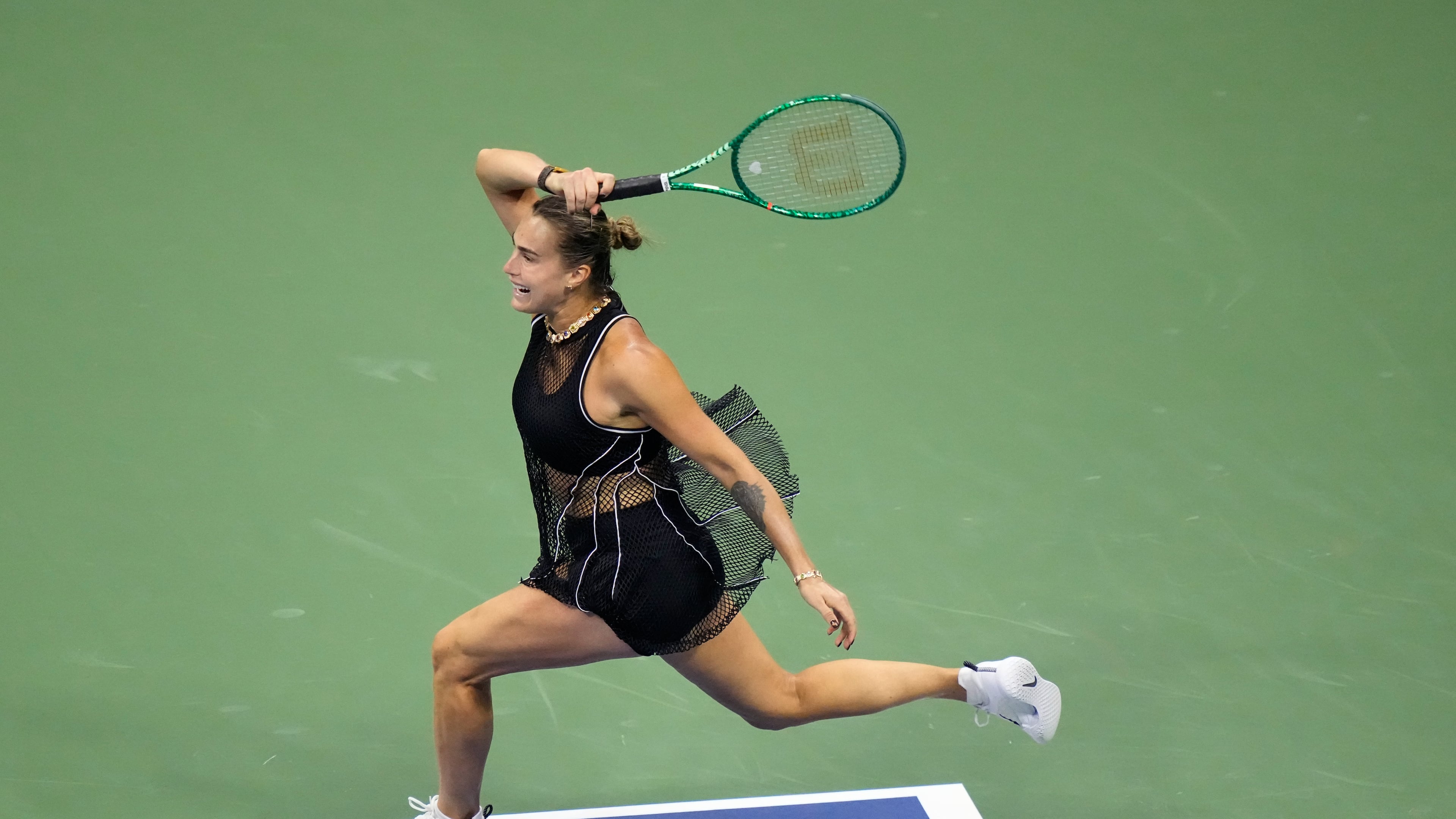Aryna Sabalenka, of Belarus, follows through on a shot to Jessica Pegula, of the United States, during the women's singles semifinals of the U.S. Open tennis championships Thursday, Sept. 10, 2026, in New York. (AP Photo/Frank Franklin II)