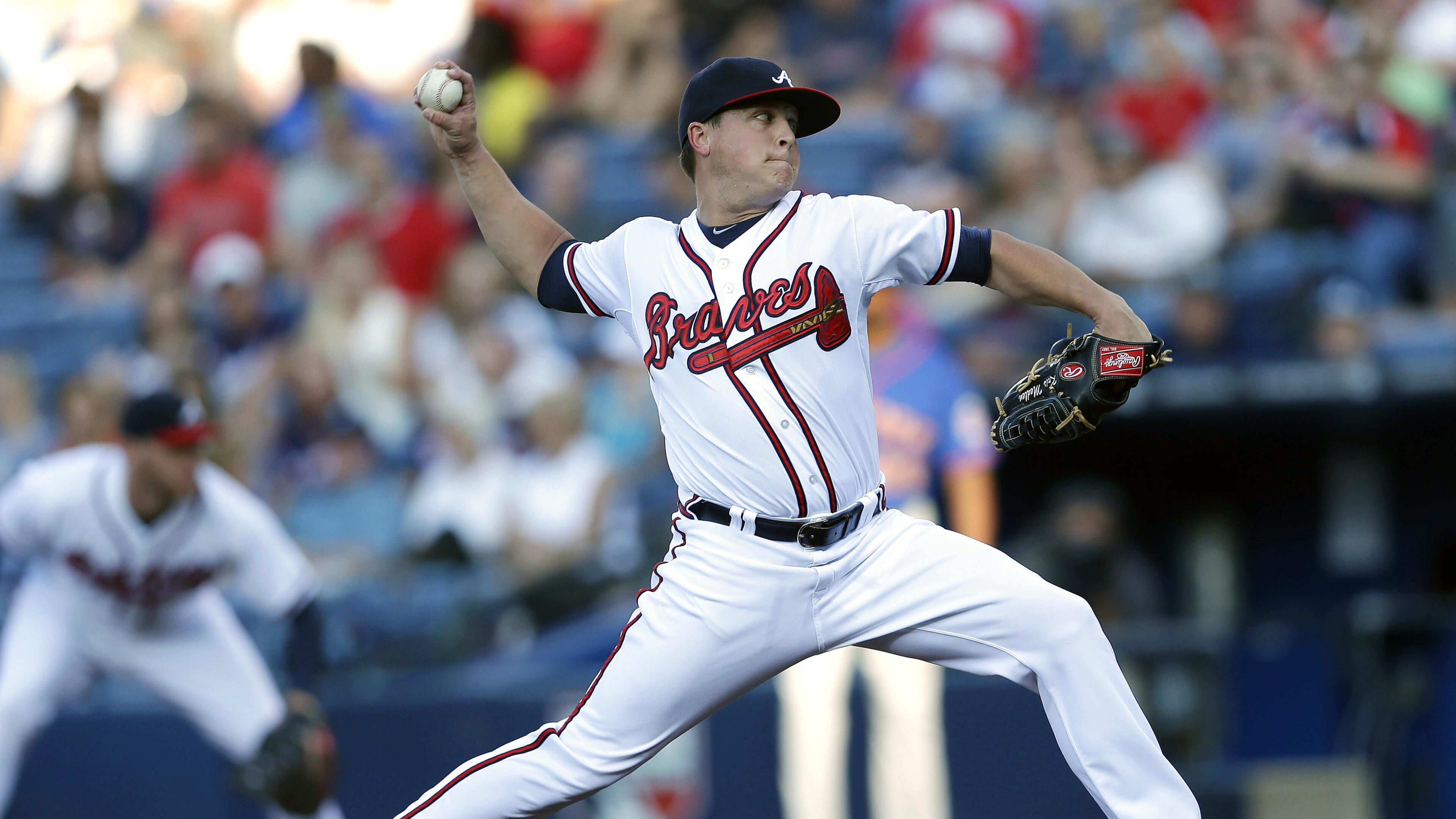 Kris Medlen works in the first inning of a baseball game against the New York Mets, June 19, 2013, in Atlanta.