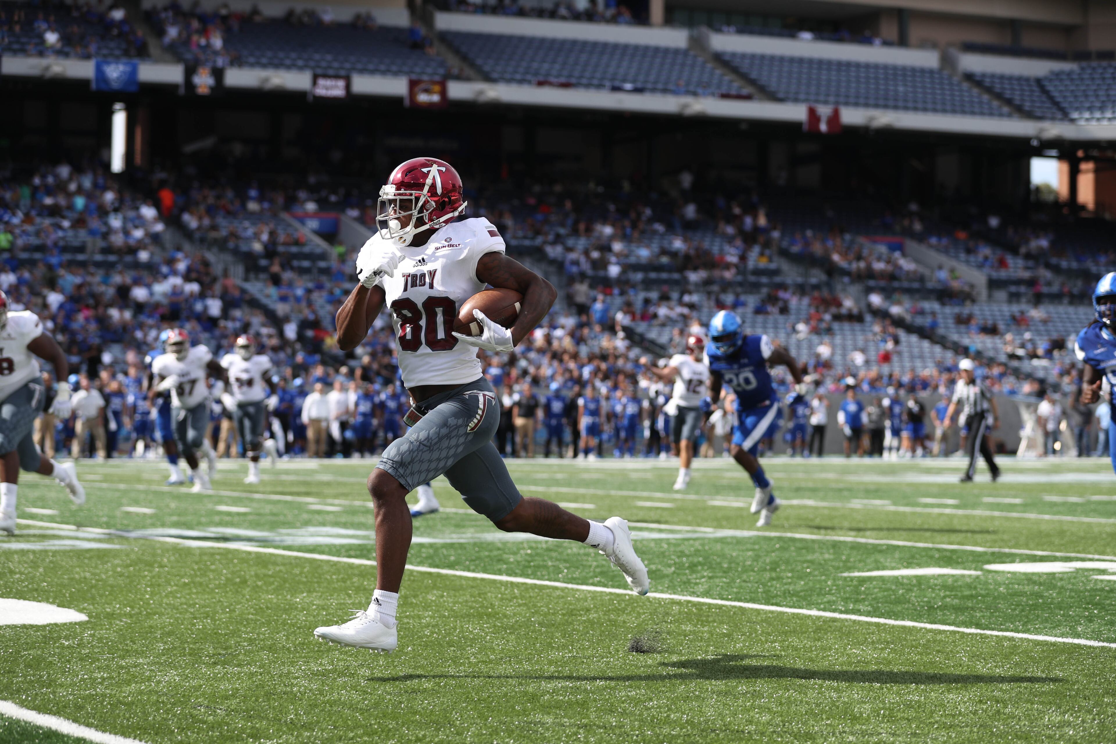 October 21, 2017 - Atlanta, Ga: Troy Trojans wide receiver Deondre Douglas (80) scores a 35-yard touchdown run in the second quarter against the Georgia State Panthers at GSU Stadium Saturday, October 21, 2017, in Atlanta.. PHOTO / JASON GETZ