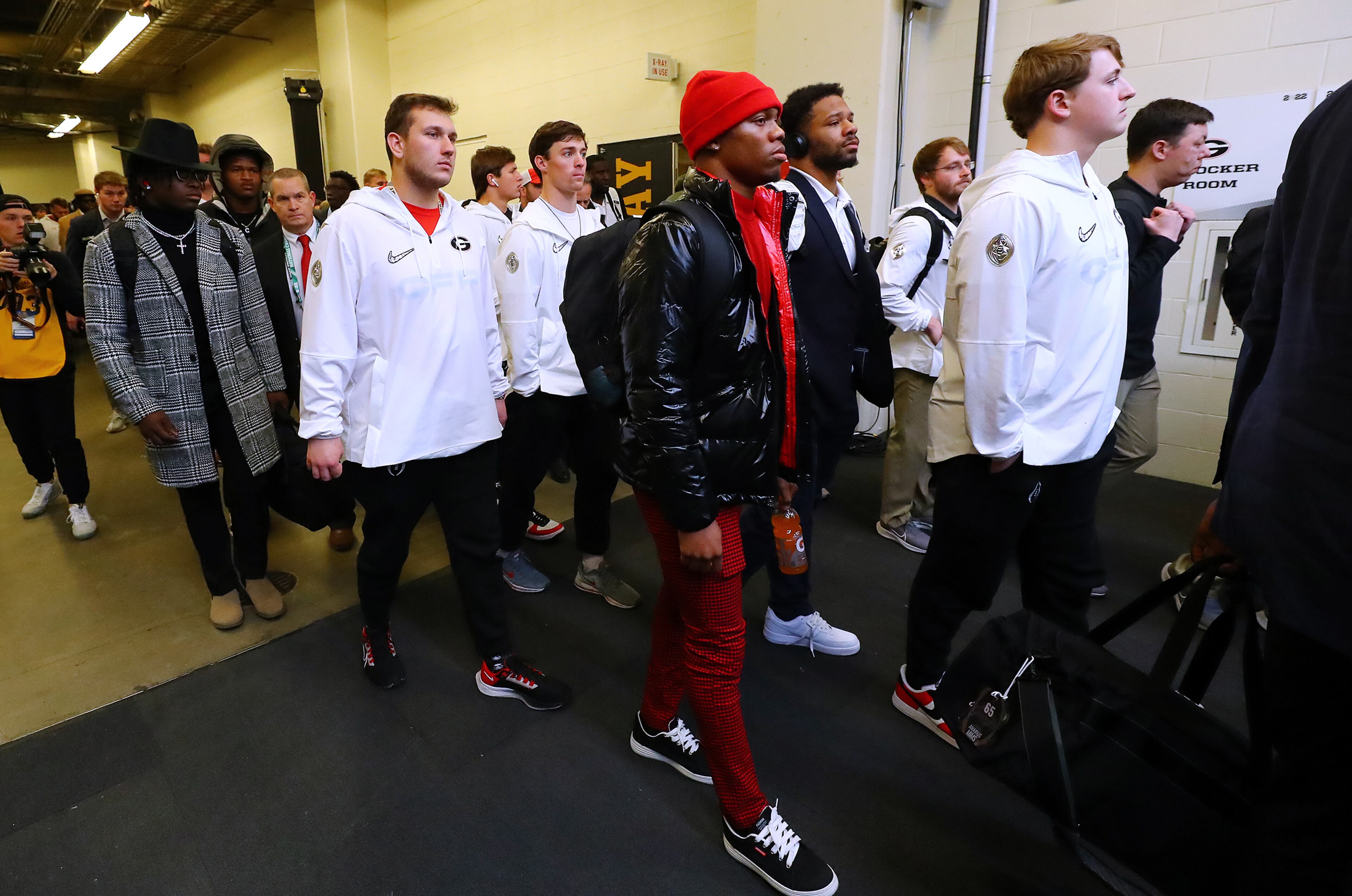 The Georgia football team arrives at Lucas Oil Stadium to play Alabama in the College Football Playoff Championship game on Monday, Jan. 10, 2022, in Indianapolis. “Curtis Compton / Curtis.Compton@ajc.com”`