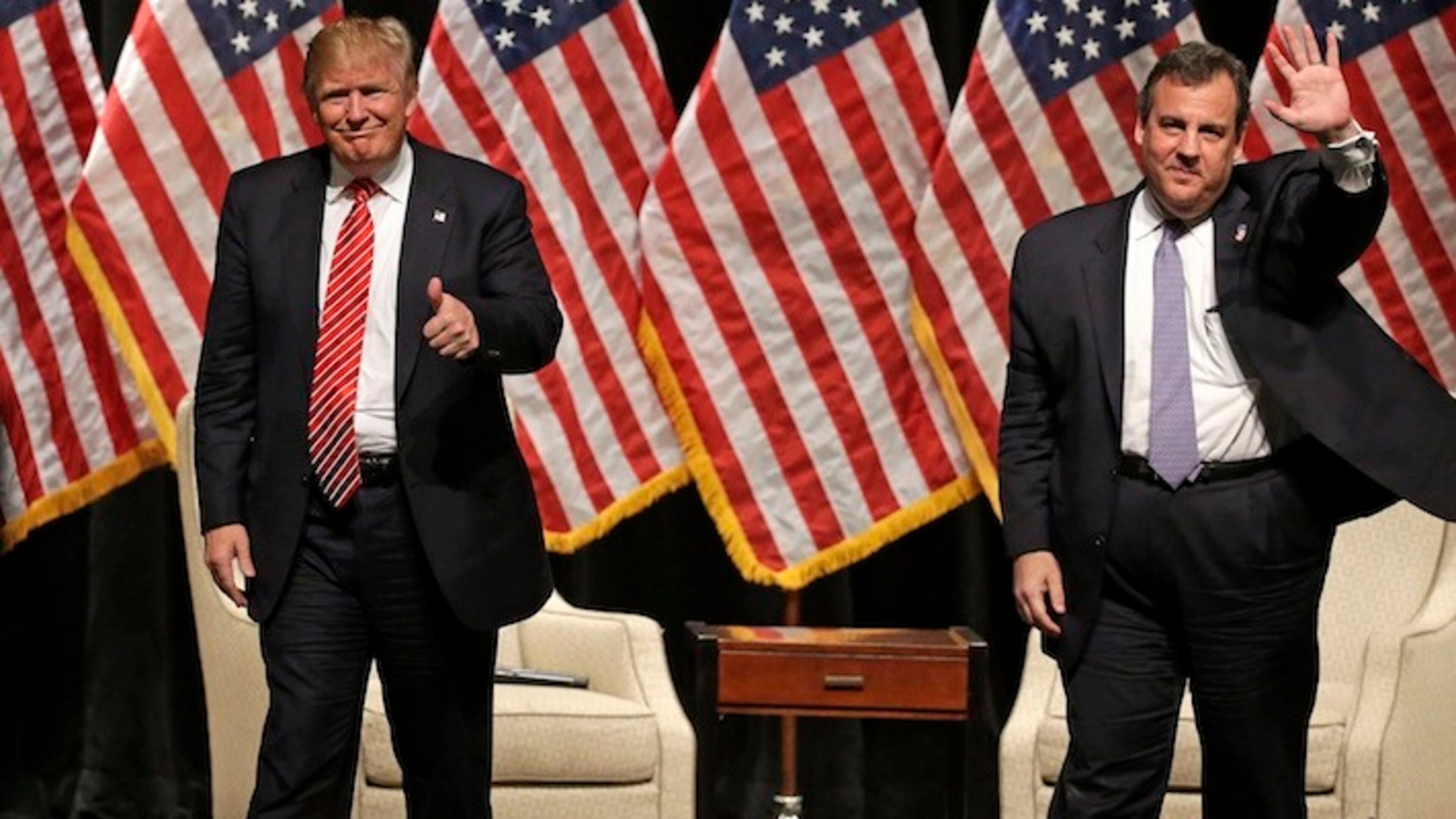 In this March 14, 2016 file photo, Republican presidential candidate Donald Trump gives a thumbs up as New Jersey Gov. Chris Christie waves to the crowd as they walk off the stage after a rally at Lenoir-Rhyne University in Hickory, N.C. Christieís decision to endorse Donald Trump back in February brought him plenty of derision at the time. But itís bringing rewards now that itís clear he bet on the winner. (AP Photo/Chuck Burton, File)
