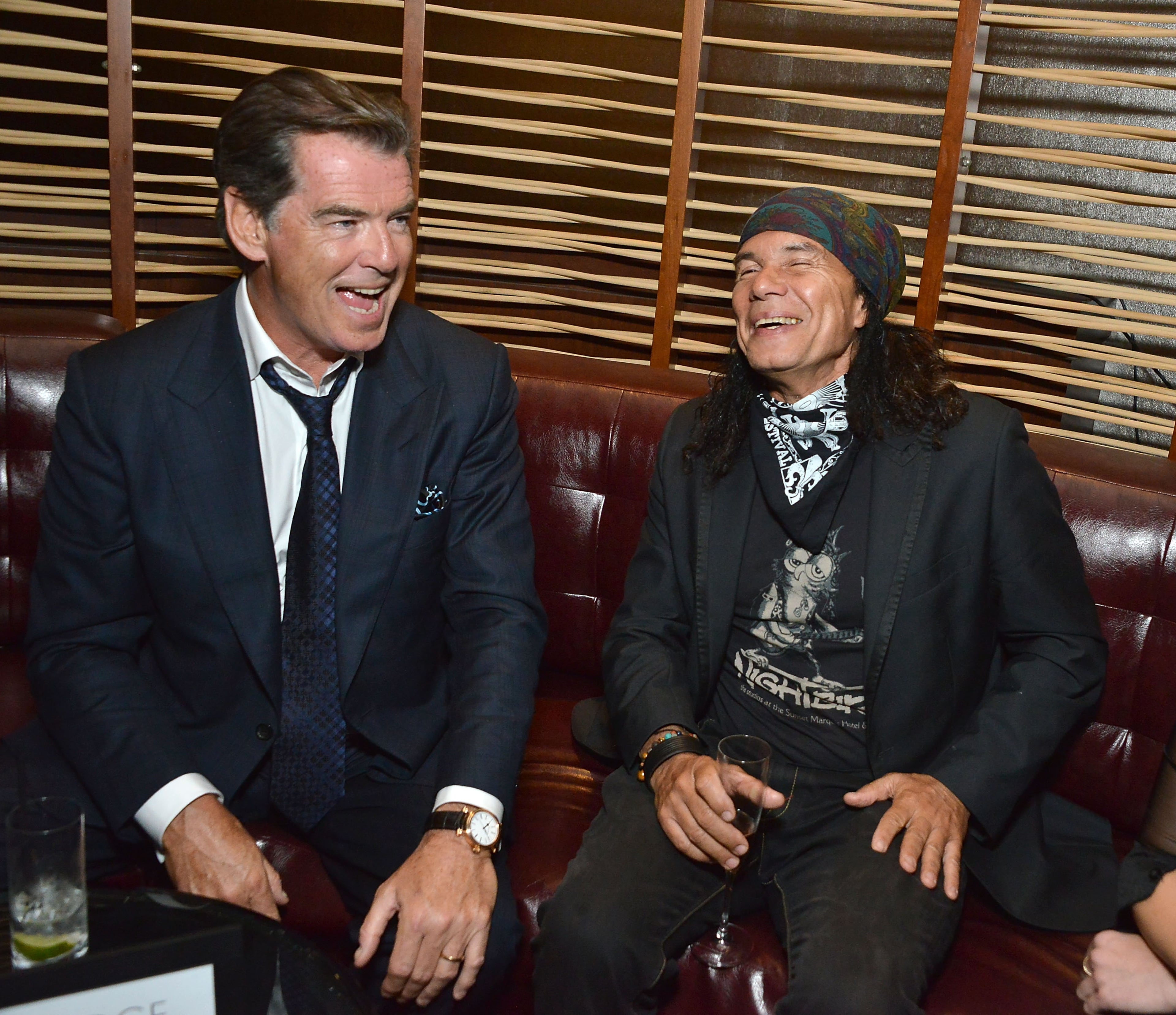LOS ANGELES, CA - AUGUST 17: Pierce Brosnan and Wayne Jobson attend the premiere of the Weinstein Company's 'No Escape' at Regal Cinemas L.A. Live on August 17, 2015 in Los Angeles, California. (Photo by Araya Diaz/Getty Images for The Weinstein Company)