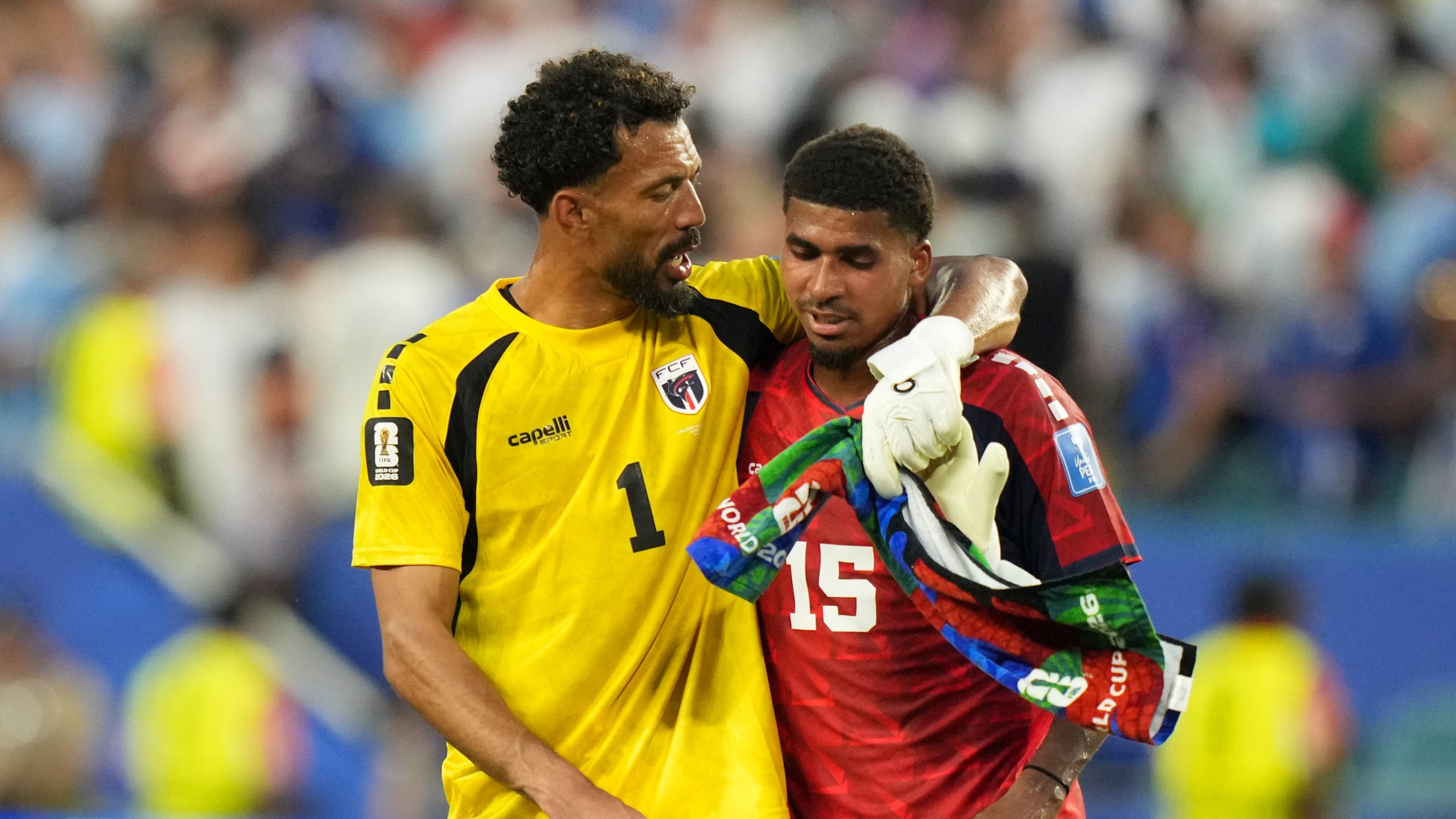 Cape Verde goalkeeper Vozinha, left, and Laros Duarte react at the end of the World Cup Group H soccer match between Uruguay and Cape Verde in Miami Gardens, Fla., Sunday, June 21, 2026. (AP Photo/Lynne Sladky)