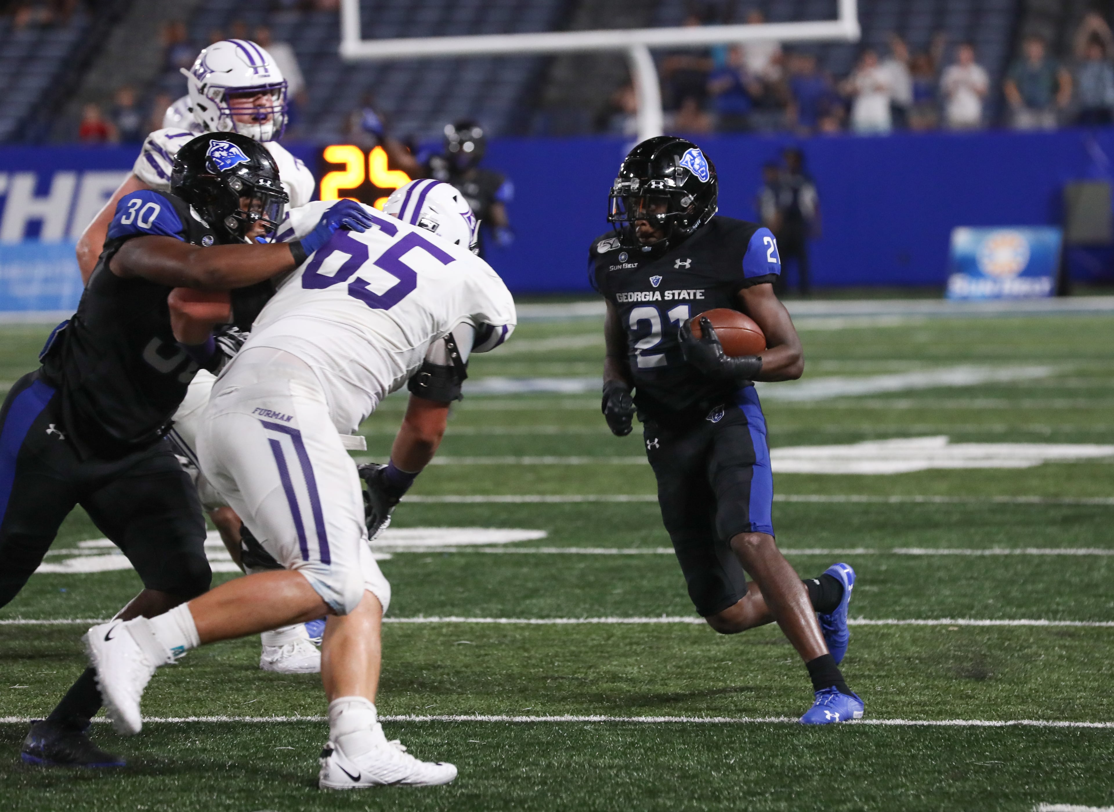 Georgia State Panthers safety Remy Lazarus (21) runs after intercepting the ball during the second half of a college football game against Furman Paladins at Georgia State Stadium, Saturday, Sept. 7, 2019, in Atlanta. BRANDEN CAMP/SPECIAL