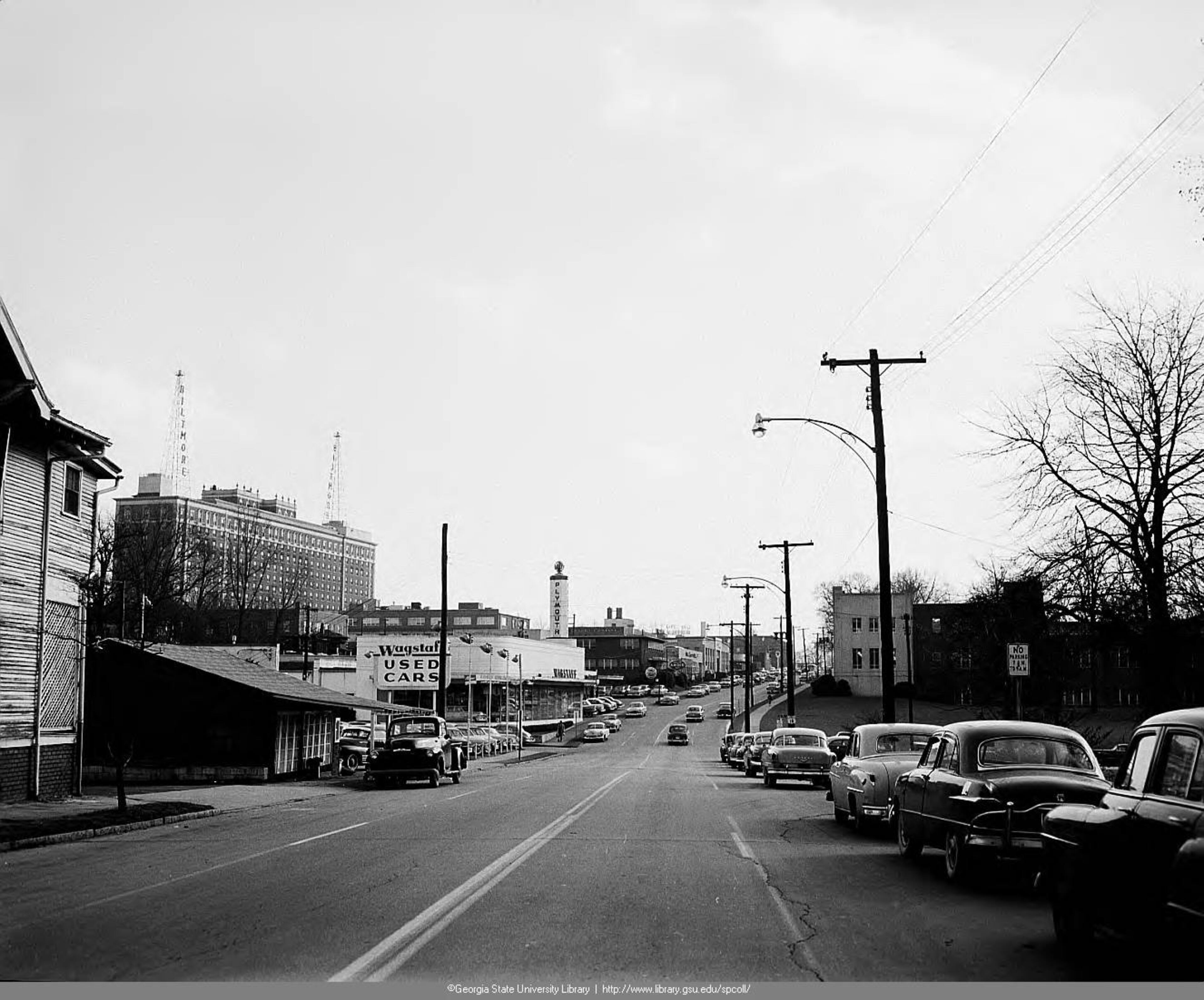 Spring Street, looking south from West Peachtree Place in 1954. Tracy O'Neal Photographic Collection. Special Collections and Archives, Georgia State University Library