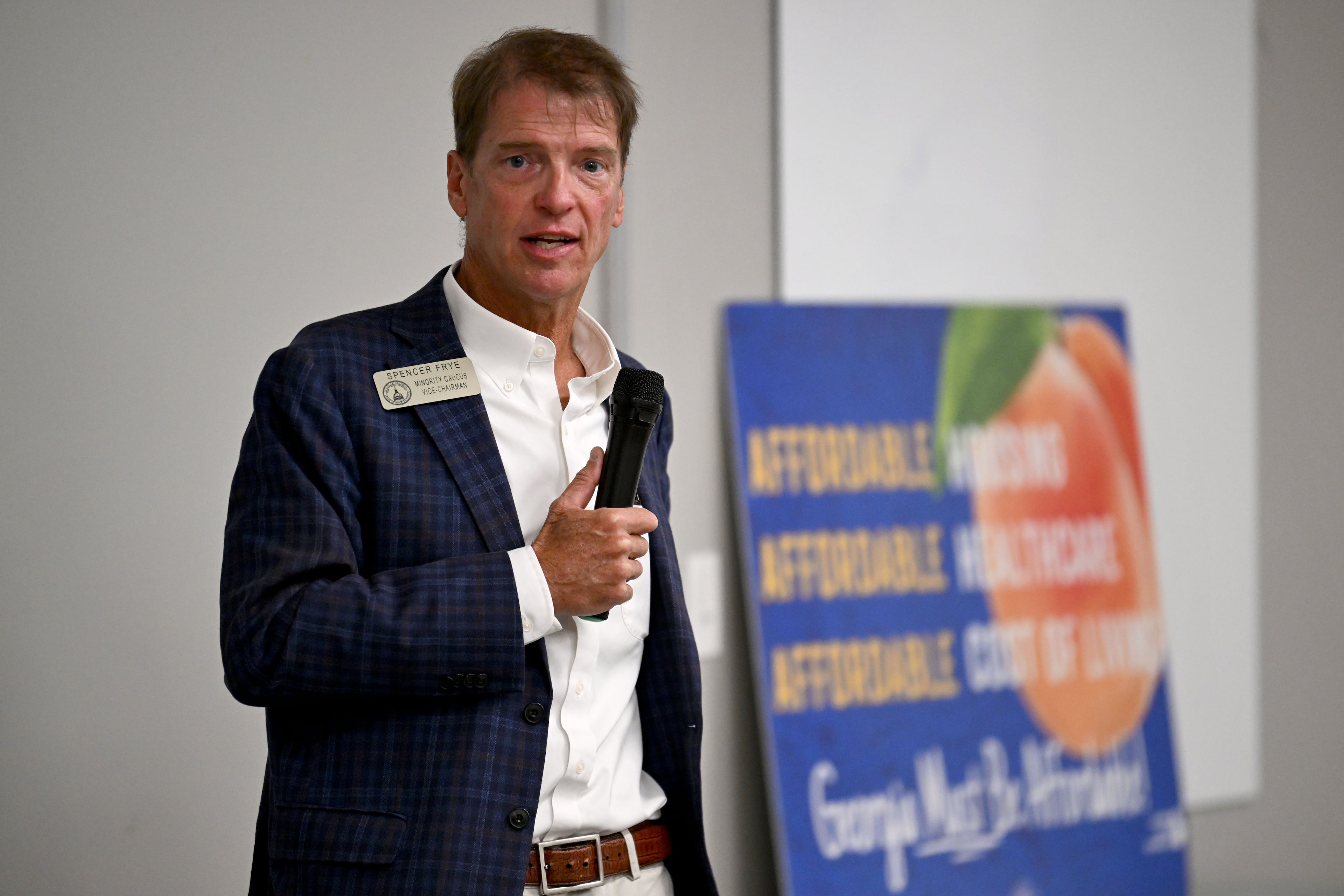 State Rep. Spencer Frye speaks during a community conversation on taxes at the Bogart Library on Tuesday. (Hyosub Shin/AJC)