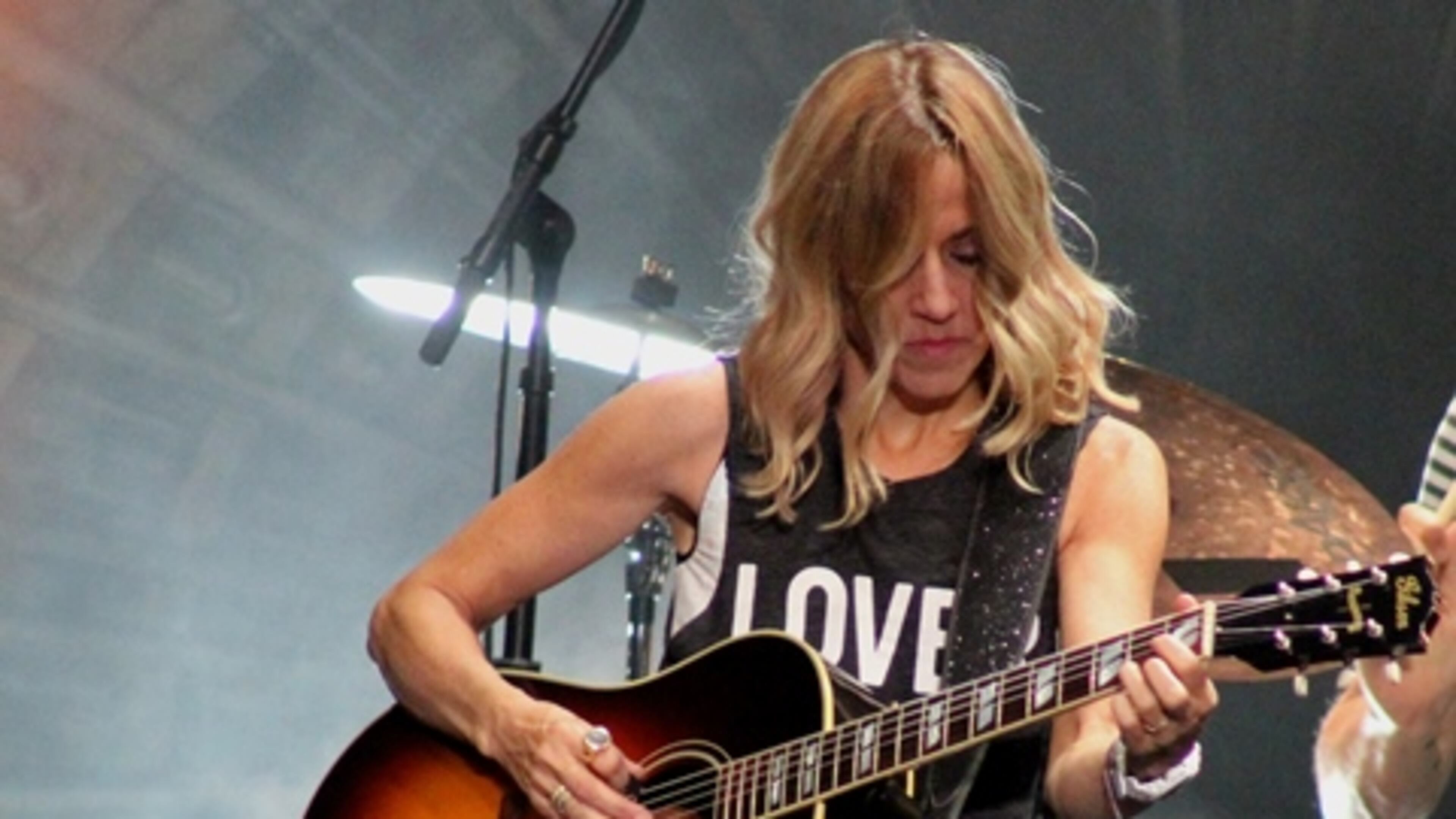 Sheryl Crow rocks it onstage at Chastain Park Amphitheatre on Sunday night. Photo: Melissa Ruggieri/AJC