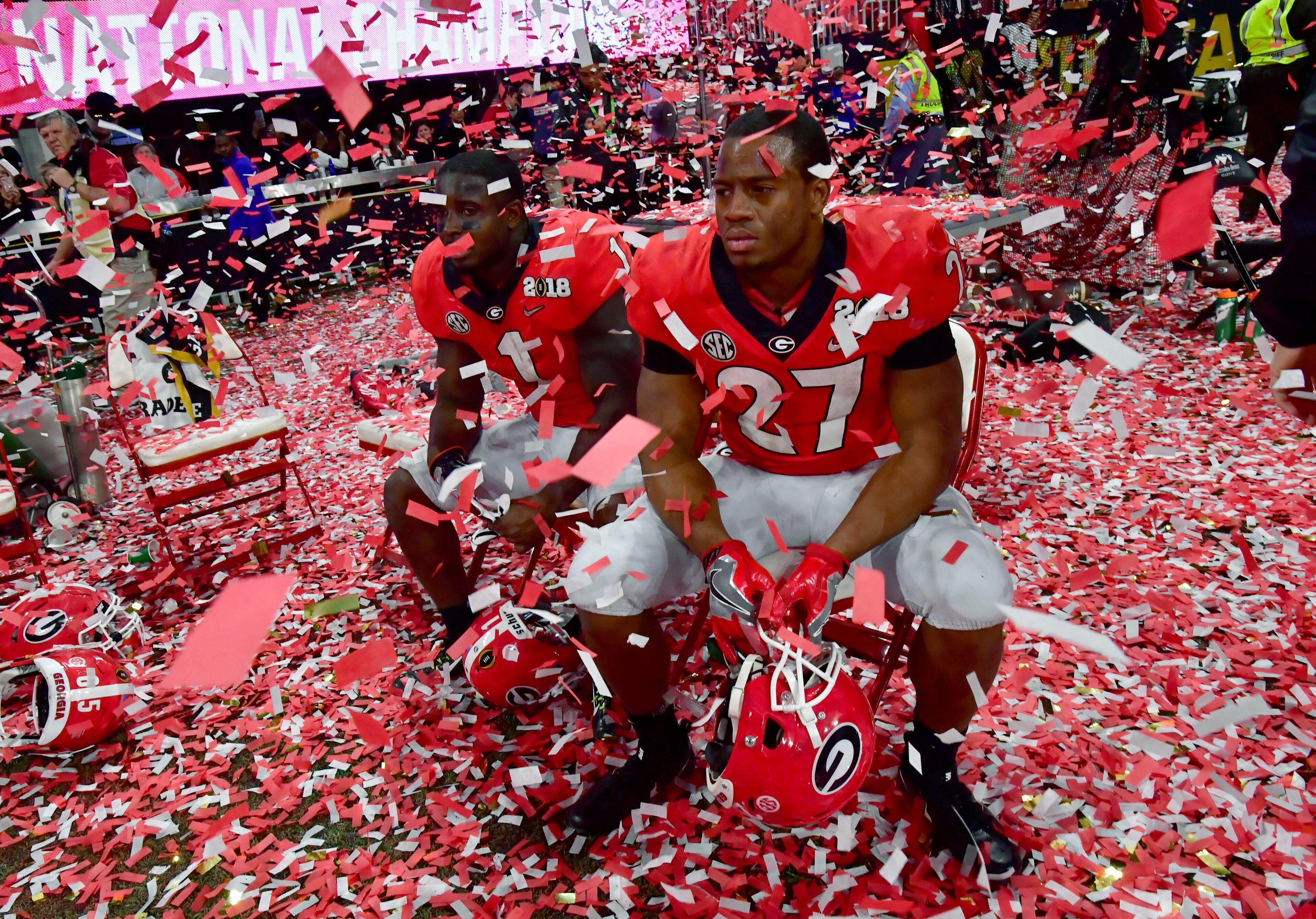 January 8, 2018 Atlanta - Georgia running back Sony Michel (1) and Georgia running back Nick Chubb (27) react after Alabama defeated the Georgia during College Football Playoff National Championship at Mercedes-Benz Stadium on Monday, January 8, 2018. Alabama came back from a 13-point second half deficit after switching to the young quarterback in a dramatic 26-23 overtime victory over Georgia in the college football title game Monday night at Mercedes-Benz Stadium. HYOSUB SHIN / HSHIN@AJC.COM