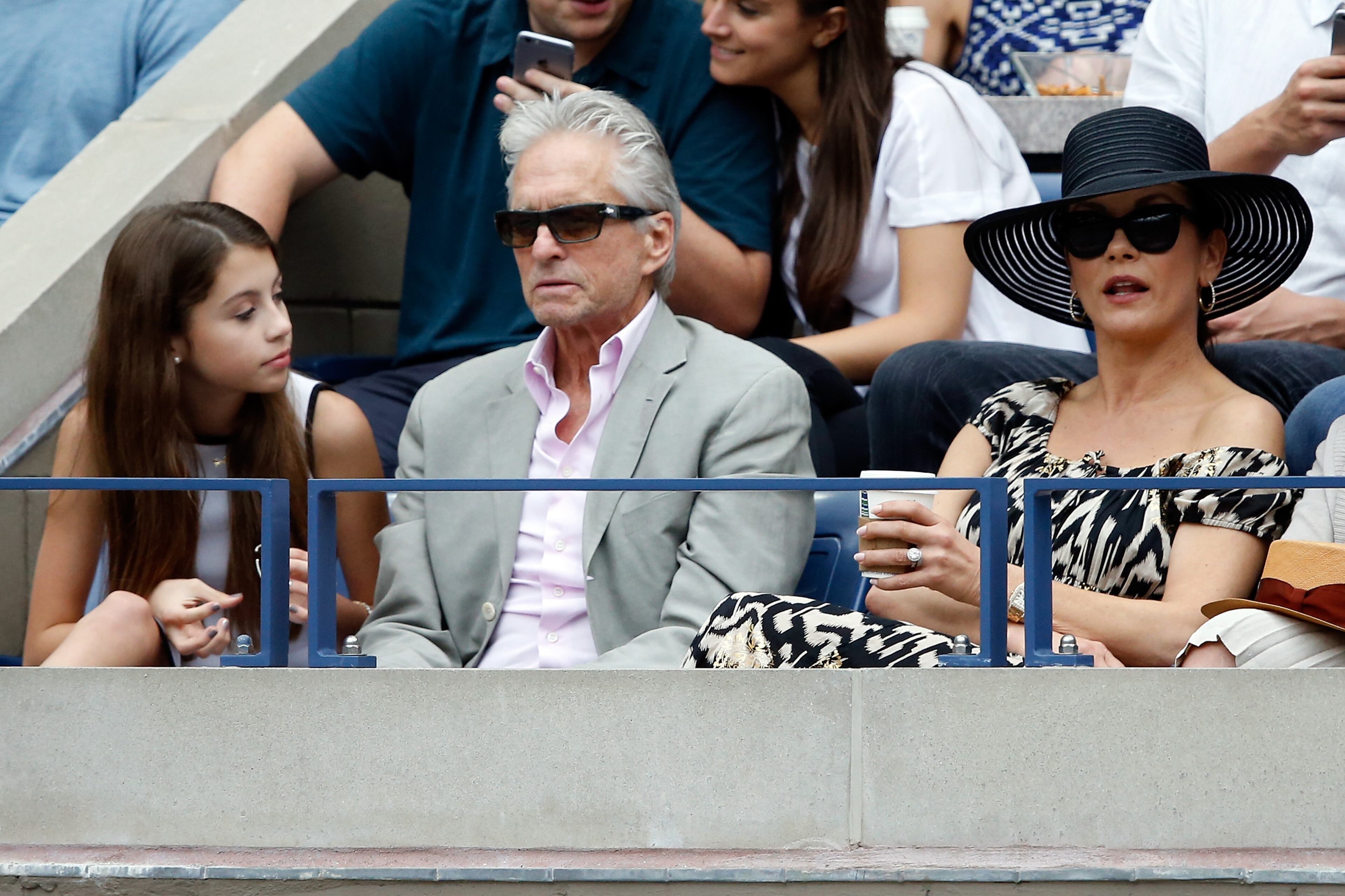 NEW YORK, NY - SEPTEMBER 12: Actors Michael Douglas and Catherine Zeta-Jones attends the Women's Singles Final match between Roberta Vinci of Italy and Flavia Pennetta of Italy on Day Thirteen of the 2015 US Open at the USTA Billie Jean King National Tennis Center on September 12, 2015 in the Flushing neighborhood of the Queens borough of New York City. (Photo by Michael Heiman/Getty Images)