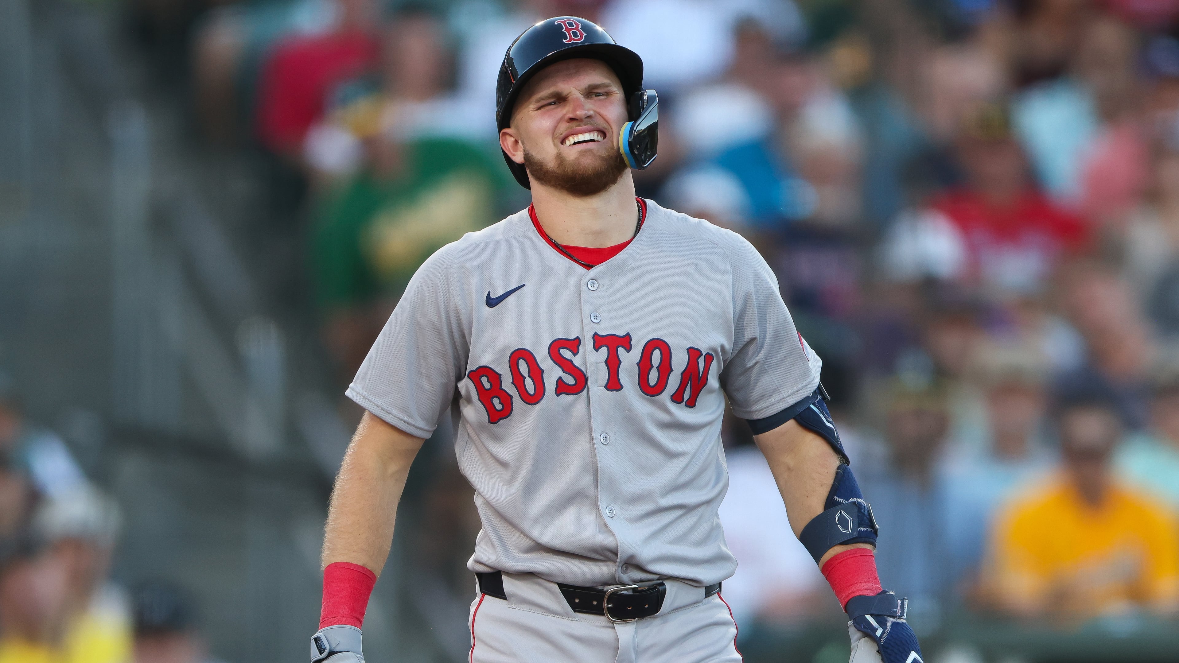 Boston Red Sox's Curtis Mead reacts after being hit by a pitch during the fourth inning of a baseball game against the Athletics, Monday, July 27, 2026, in West Sacramento, Calif. (AP Photo/Scott Marshall)