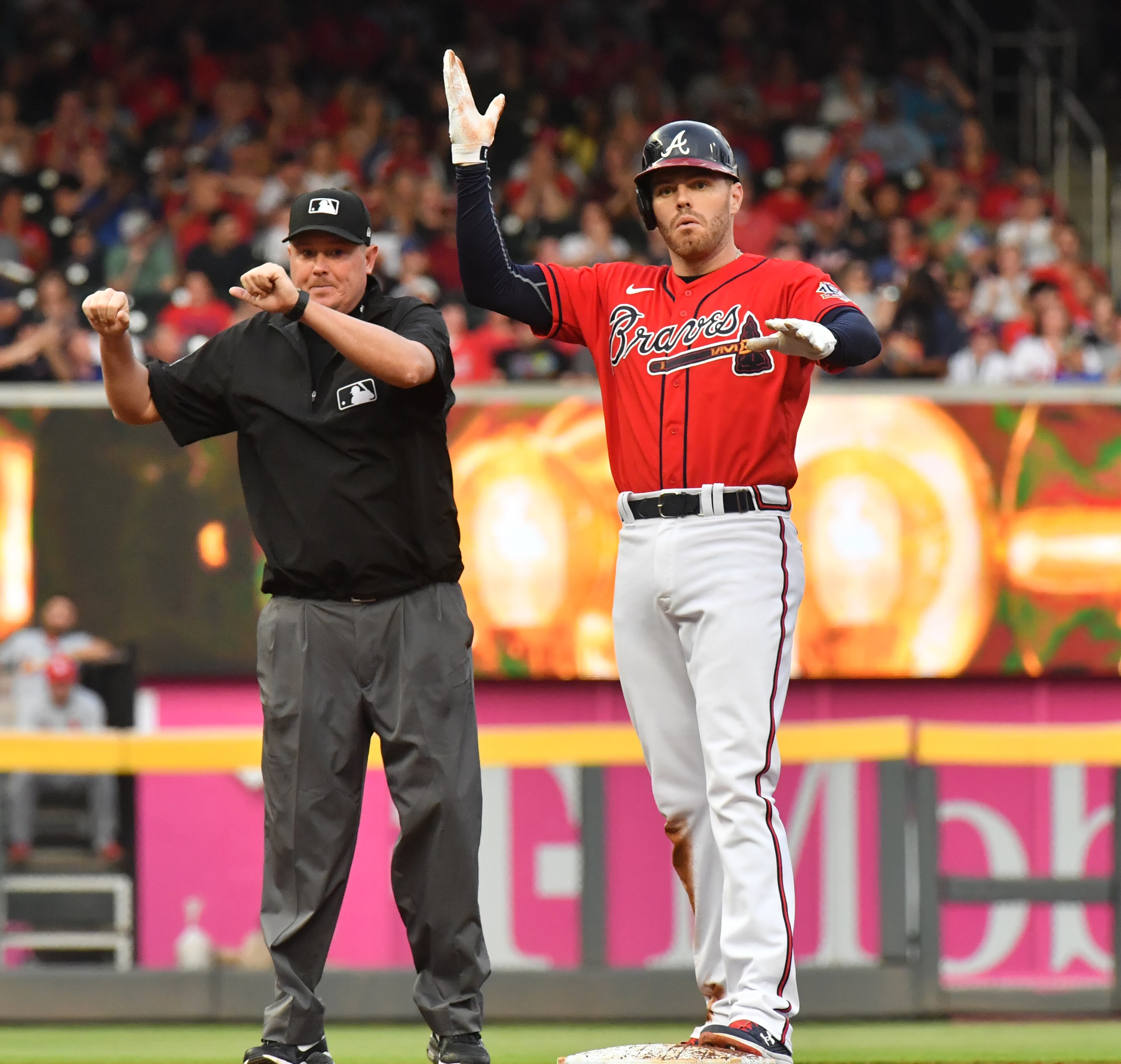 Braves first baseman Freddie Freeman (5) celebrates after hitting an RBI double in the second inning. (Hyosub Shin / Hyosub.Shin@ajc.com)